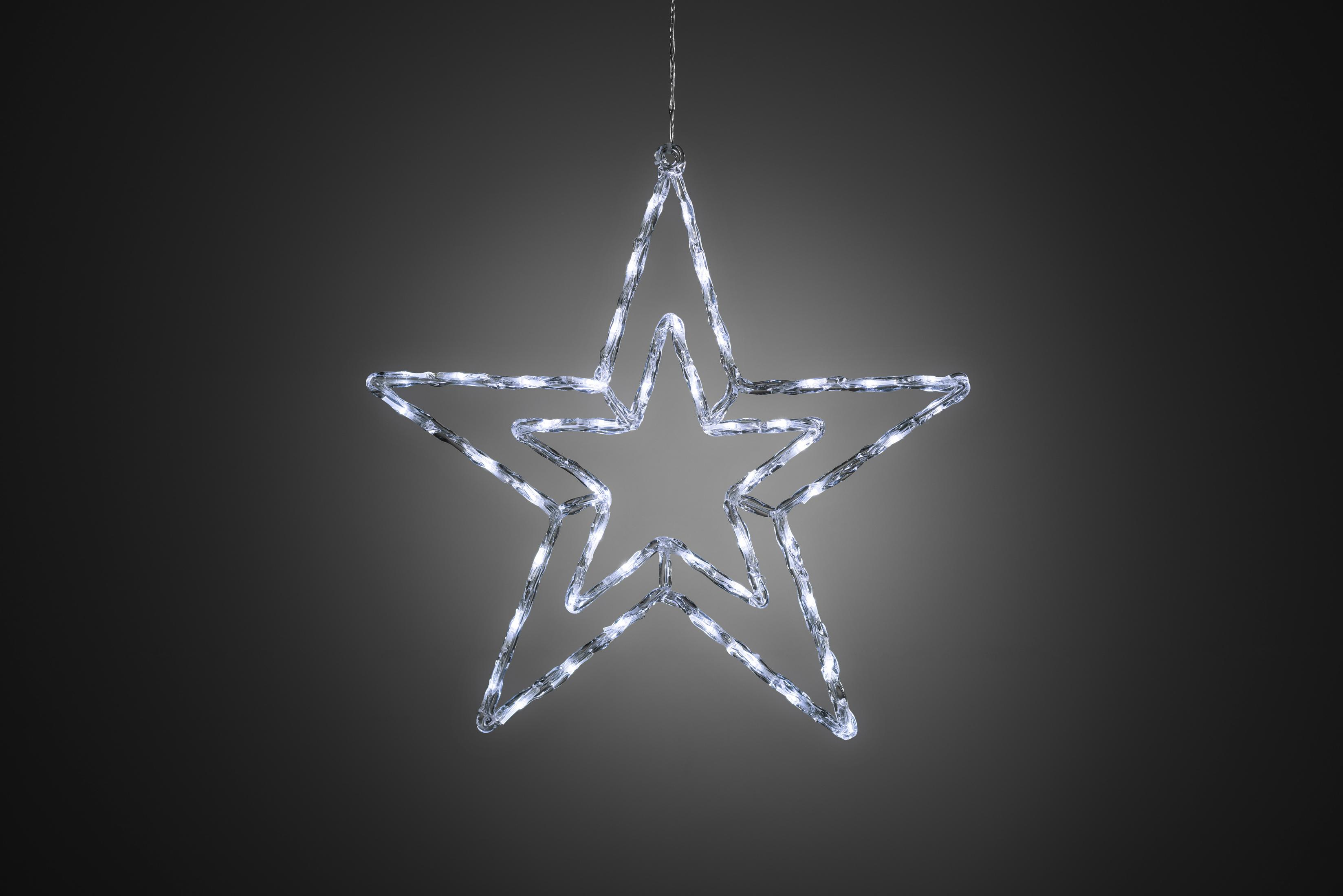 Una decorazione luminosa natalizia a forma di stella appesa su sfondo grigio. La stella è bianca con un doppio contorno.