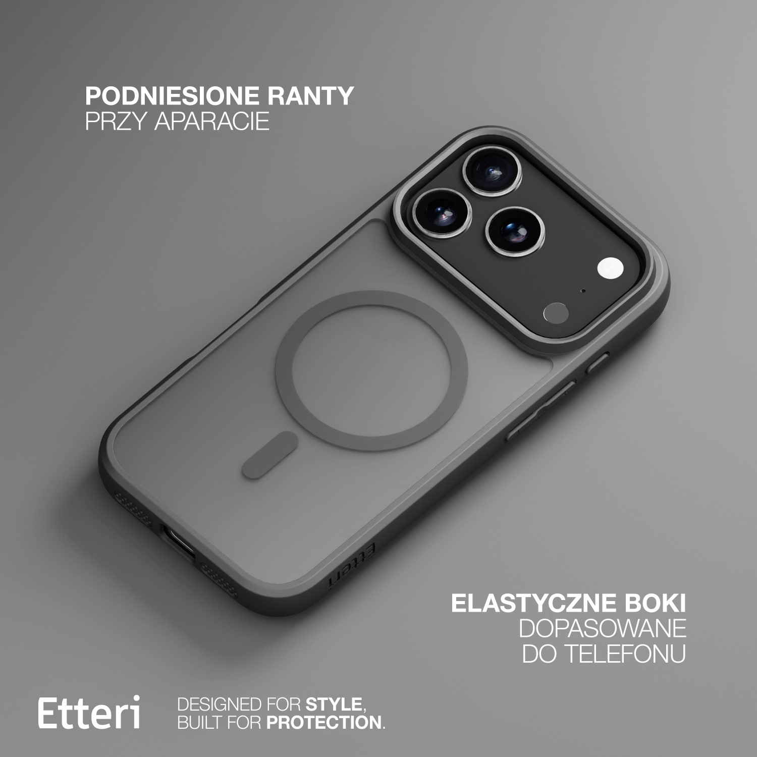 Etui na telefon w kolorze szarym i czarnym, z podwyższonymi krawędziami. Etui posiada magnetyczne kółko oraz tekst 'Etteri' i 'Designed for Style'.