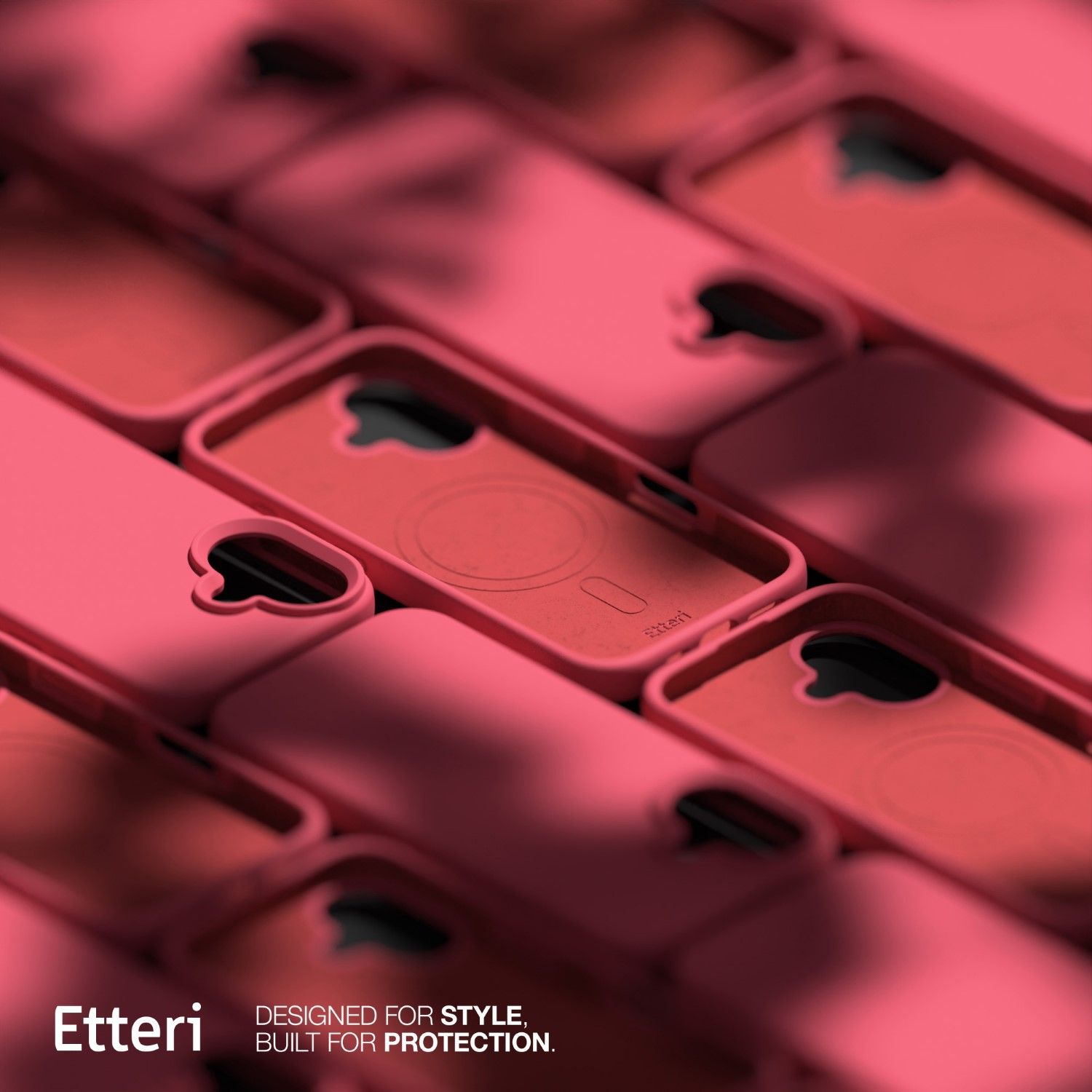 Custodie per telefoni rosa disposte, alcune a fuoco. Le custodie hanno un ritaglio per la fotocamera e il marchio 'Etteri'.