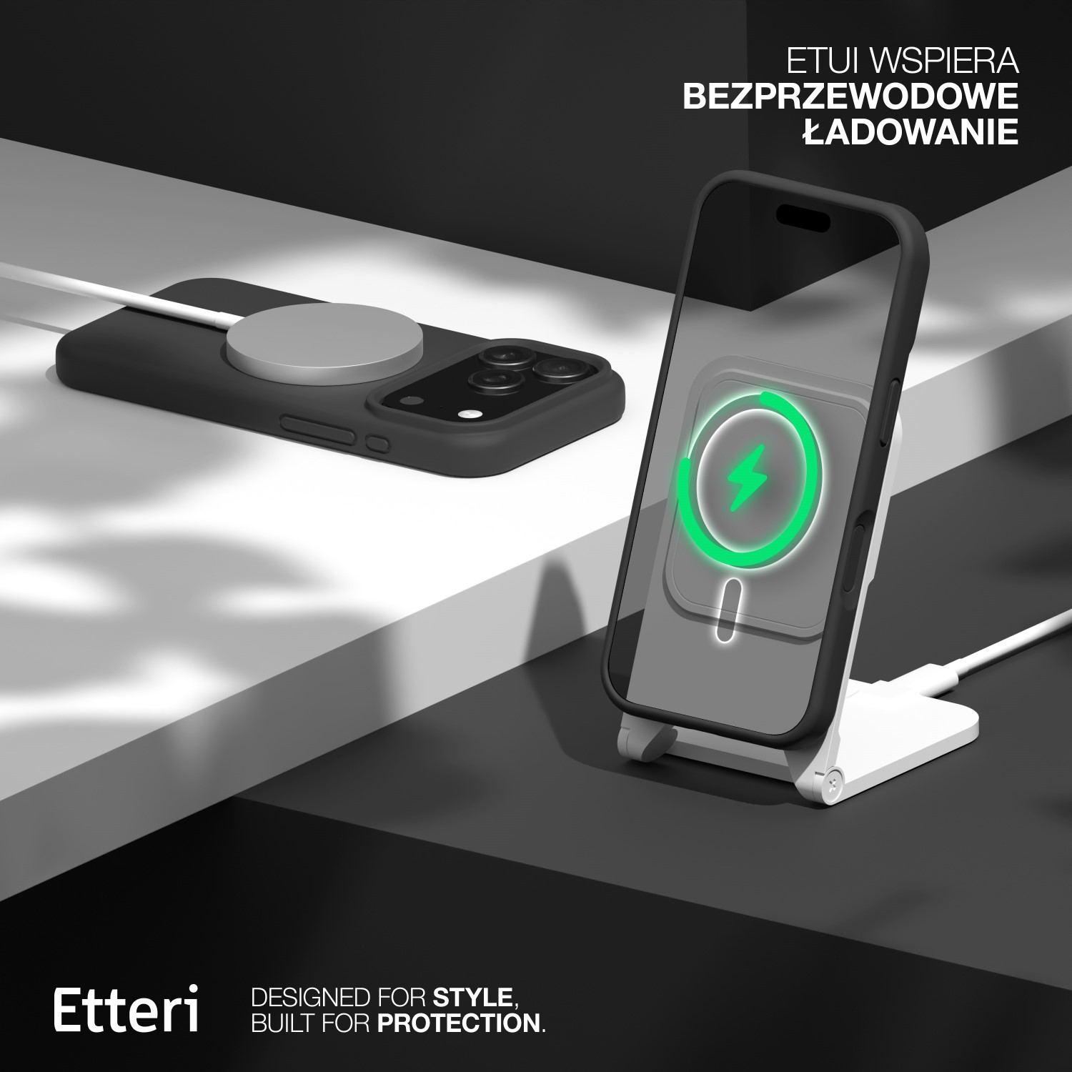 Telefon ładuje się bezprzewodowo na stojaku. Widoczne są również ładowarka i etui na telefon. Tło jest czarno-białe.