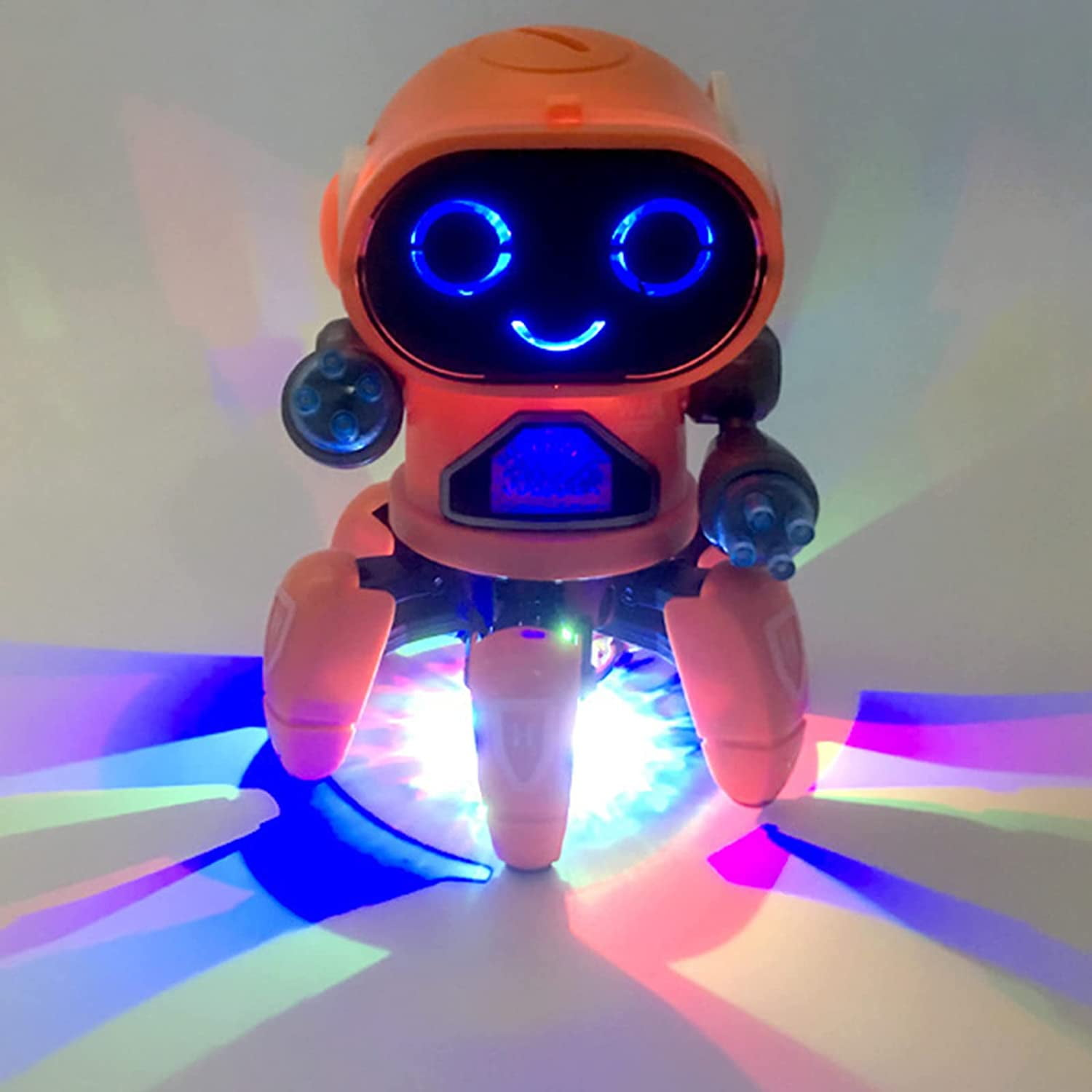Orangenes Roboterspielzeug mit blauen Augen und einem lächelnden Gesicht. Es hat farbenfrohe Lichtprojektionen.