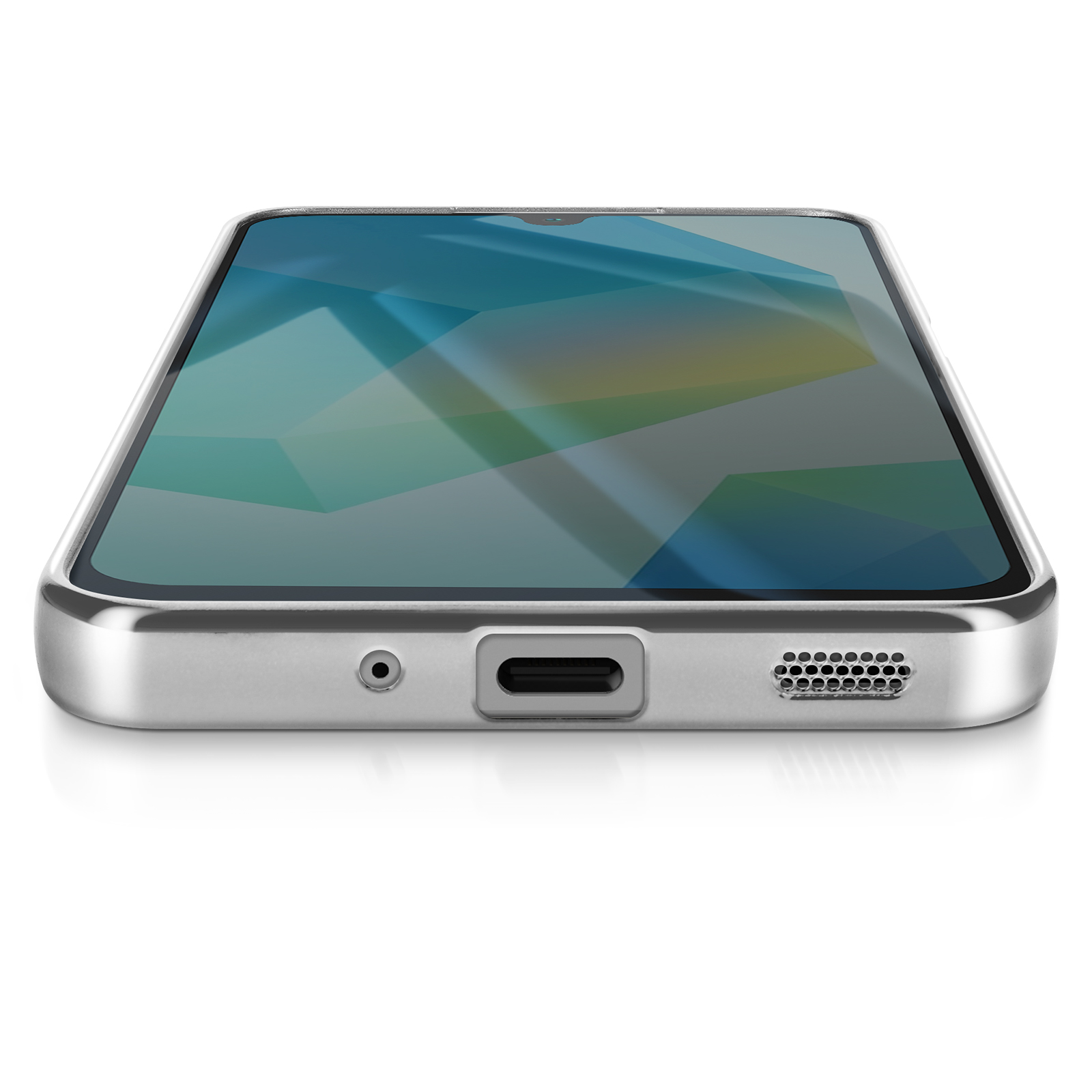 Un smartphone argenté est posé sur une surface blanche. L'écran affiche un motif géométrique bleu, vert et jaune.