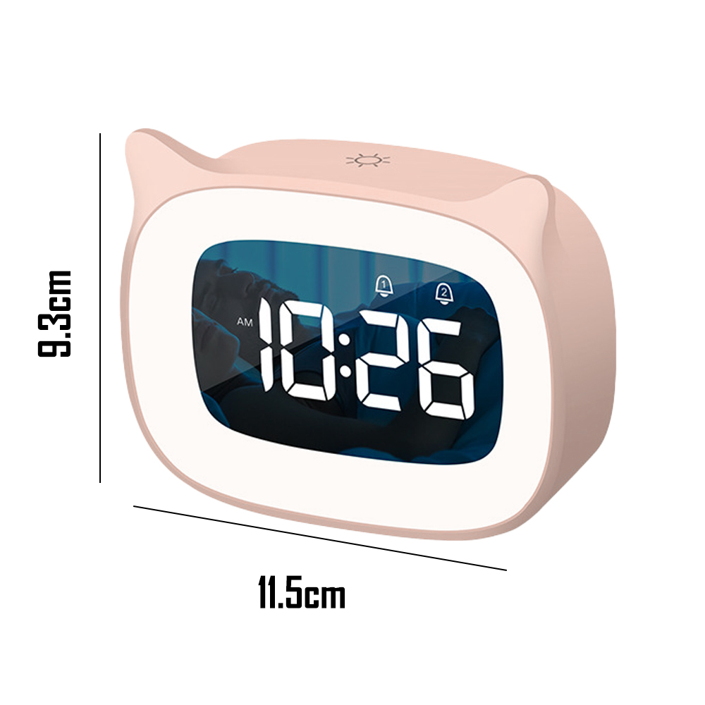 Rosa katzenförmiger digitaler Wecker mit 10:26 Uhr morgens. Abmessungen sind 9,3 cm hoch und 11,5 cm breit. Enthält Alarm- und Lichtsymbole.