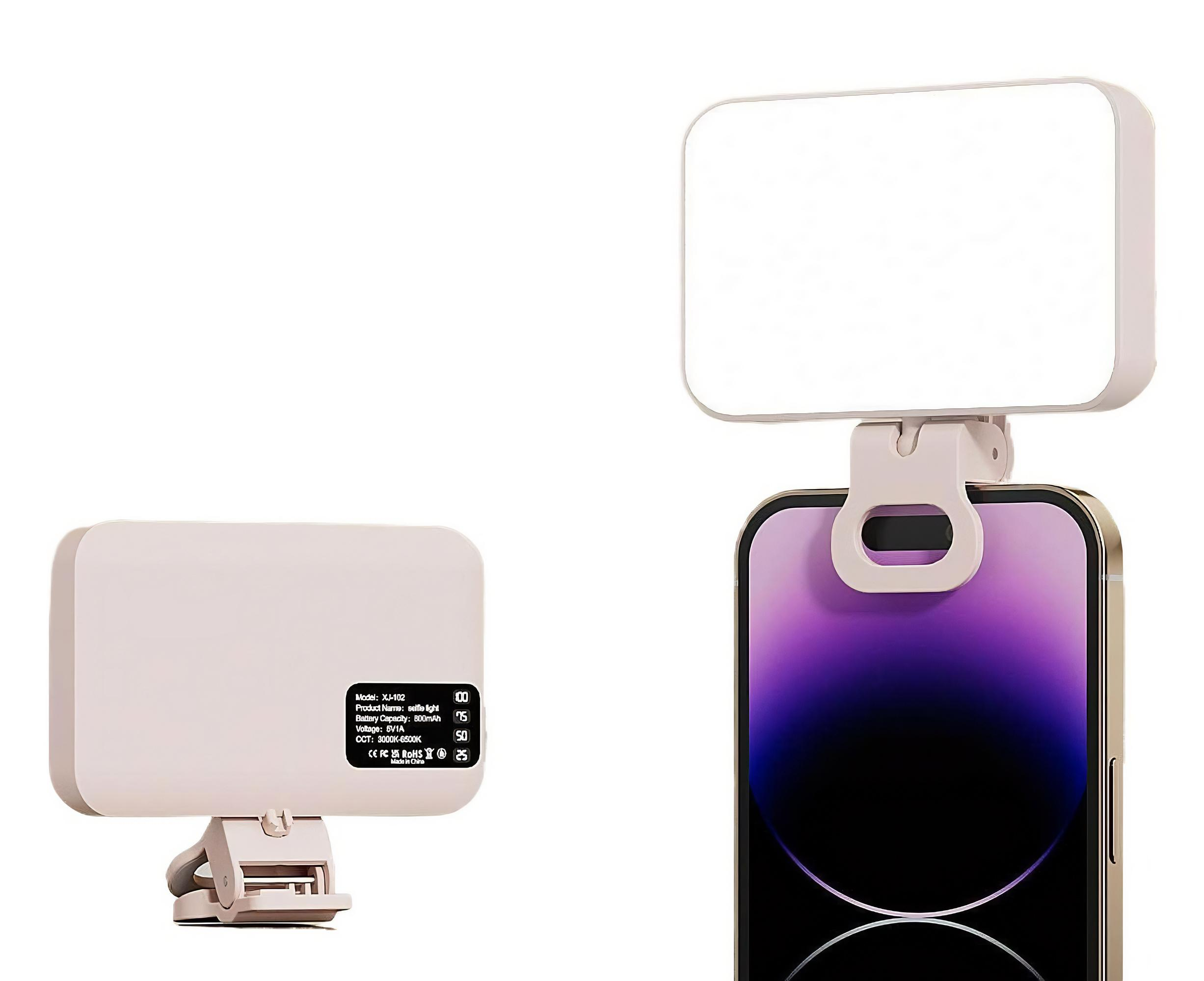 Ein Selfie-Licht ist an einem Telefon befestigt. Das Licht ist weiß und hat einen Clip zur Befestigung am Telefon.