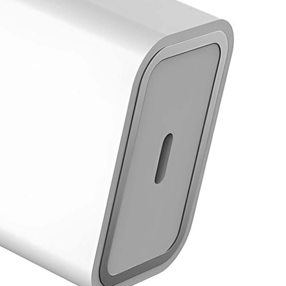 Primo piano di un dispositivo elettronico bianco e grigio. Il dispositivo è rettangolare con bordi arrotondati e una fessura.