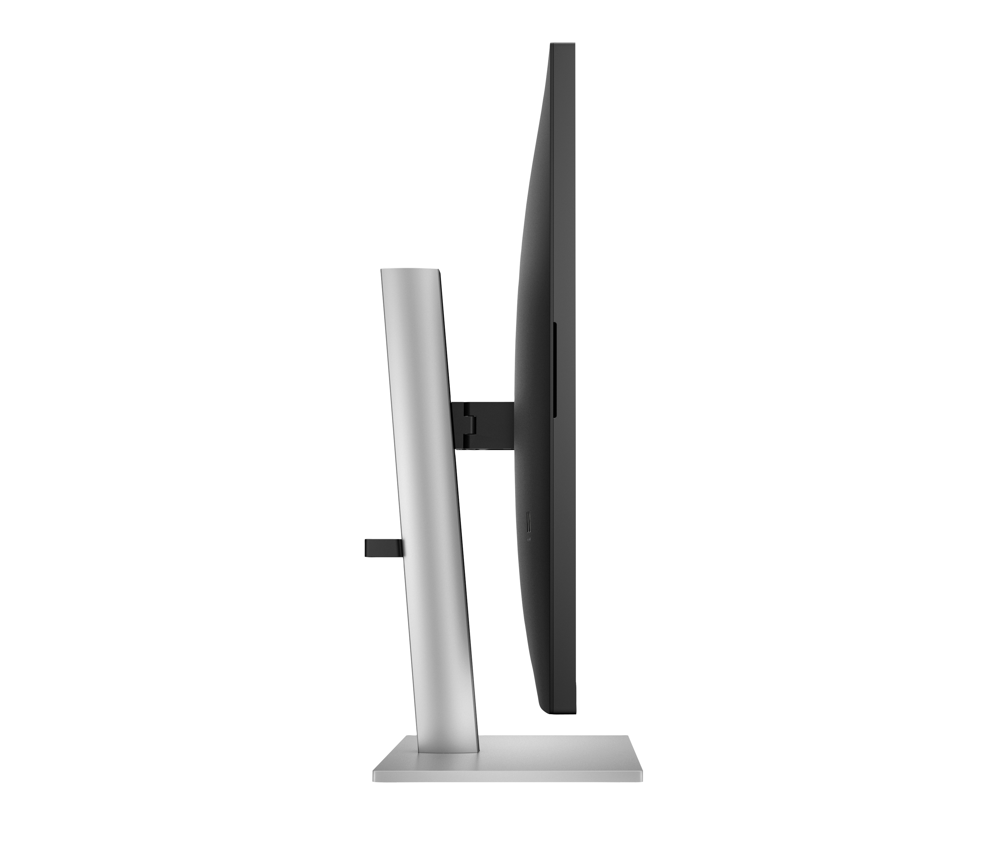 Vista laterale di un monitor per computer. Ha uno schermo nero e un supporto argentato su sfondo bianco.