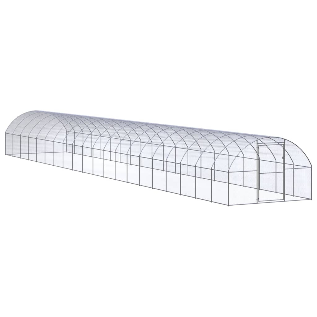 Ein langes, gewölbtes Gewächshaus. Es hat ein Metallgestell und eine transparente Kunststoffabdeckung. Am Ende ist eine Tür sichtbar.
