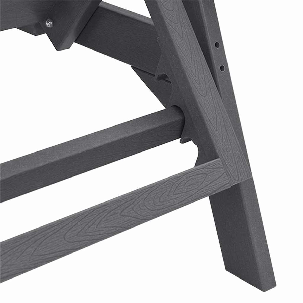 Nahaufnahme einer dunkelgrauen Holzkonstruktion, möglicherweise Möbel. Das Design zeigt ineinandergreifende Balken und Beine mit Holzmaserung.