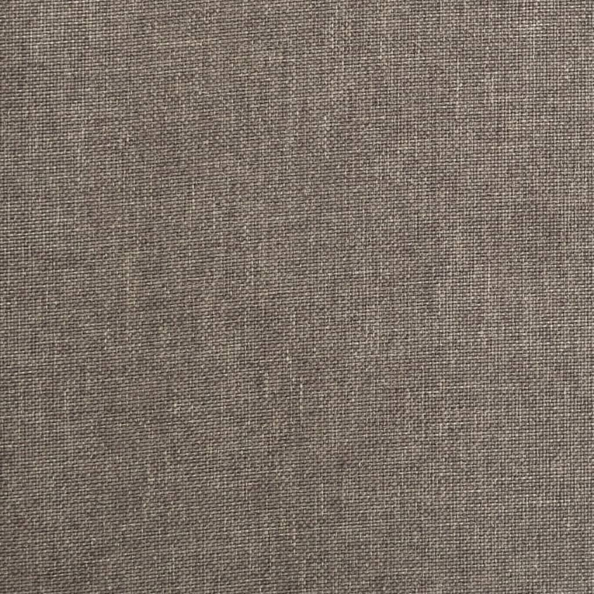 Primer plano de una tela texturizada. La tela es un material tejido en tonos grises y marrones, con superficie rugosa.