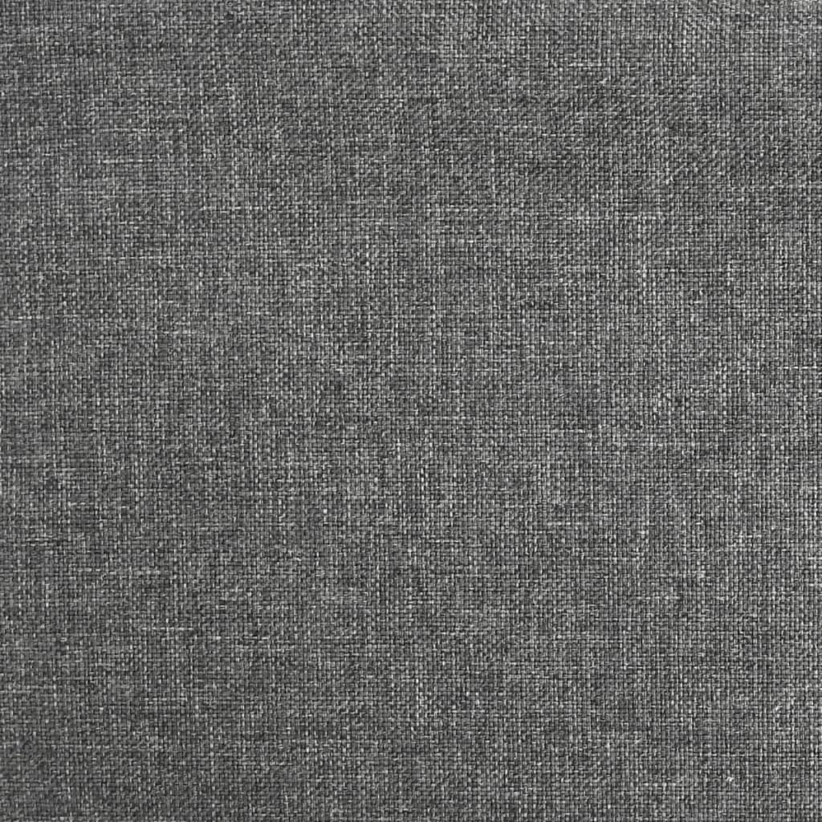 Vista de cerca de una textura de tela gris, con un patrón tejido. La tela tiene una superficie ligeramente áspera y desigual.