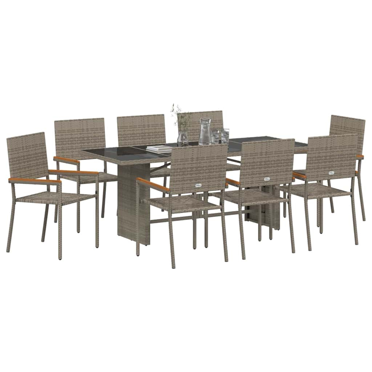Ein Ess-Set mit einem rechteckigen Tisch und acht Stühlen. Die Stühle sind aus grauem Korbgeflecht mit Holzarmlehnen. Tisch mit Glasplatte.