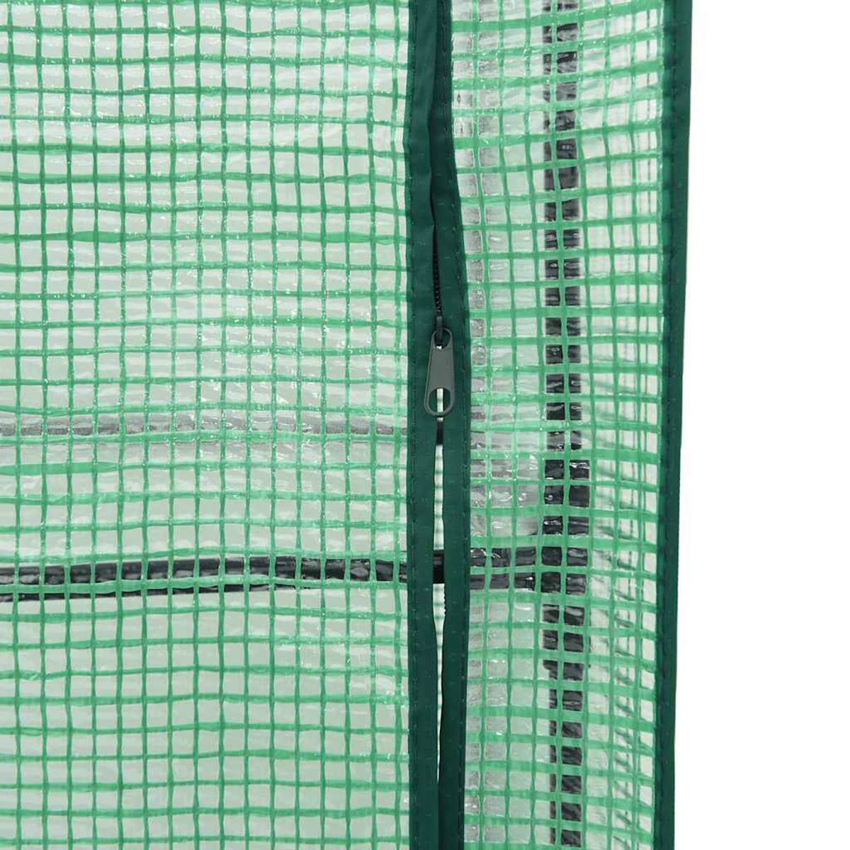 Primo piano di una copertura per serra in plastica verde con cerniera. La copertura ha un motivo a griglia. La cerniera è centrata.