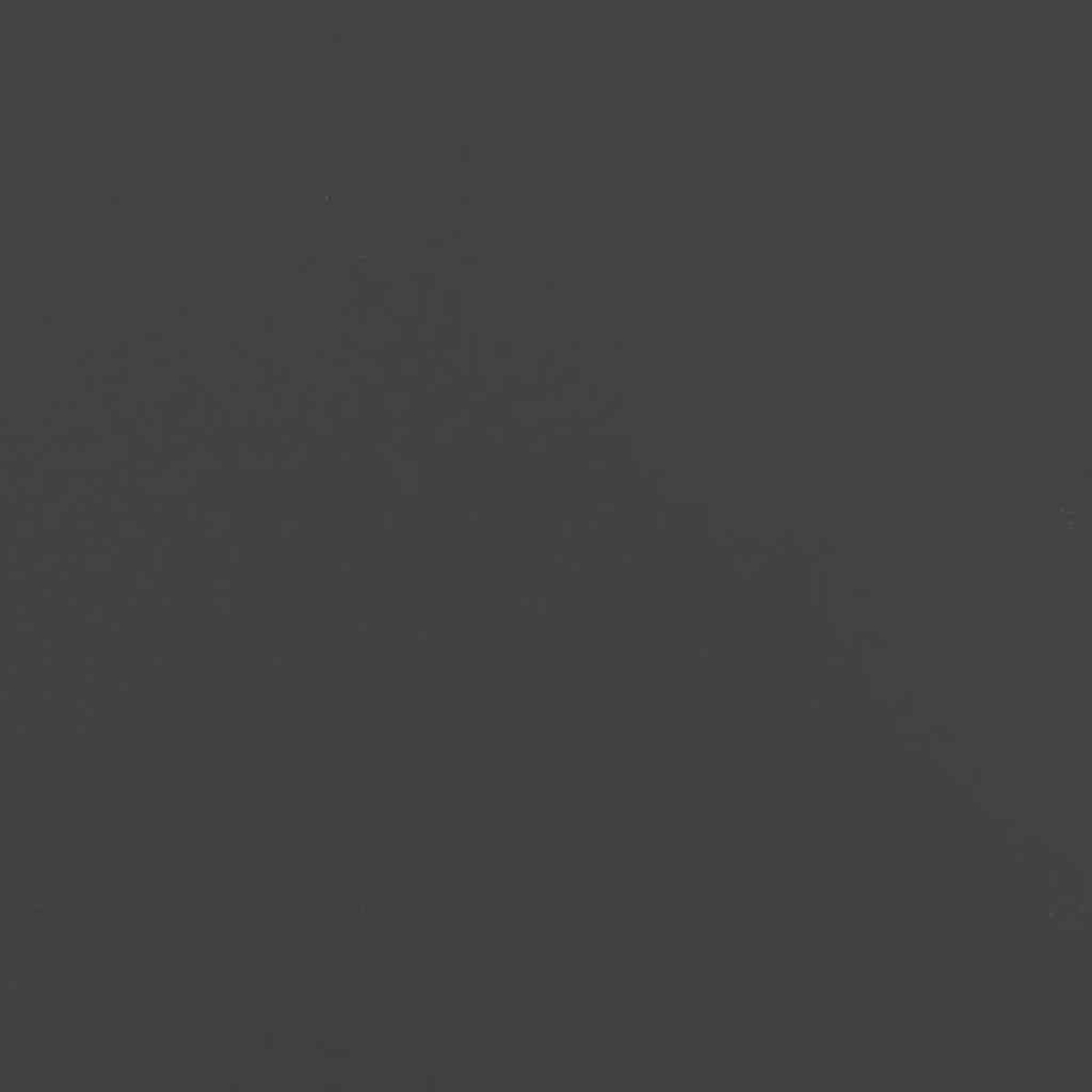Ein monochromes Bild mit einem dunkelgrauen Farbverlauf. Es gibt leichte Texturunterschiede mit subtilen Mustern.