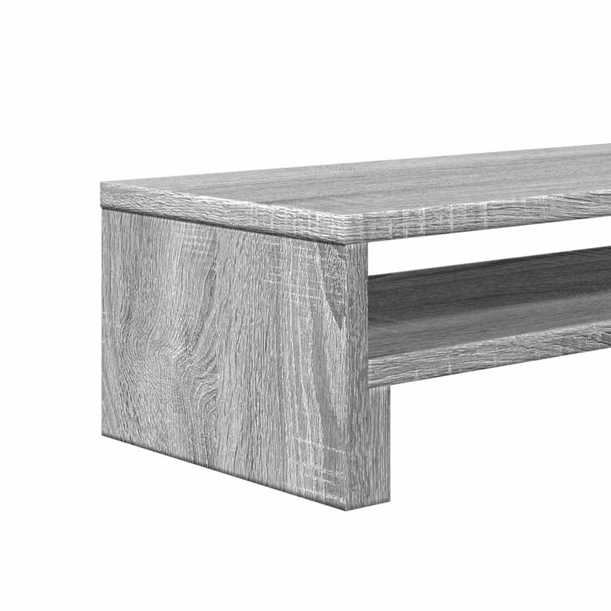 Nahaufnahme eines grauen Holzregals mit sichtbarer Holzmaserung. Es hat eine rechteckige Form mit einem offenen Regal darunter.