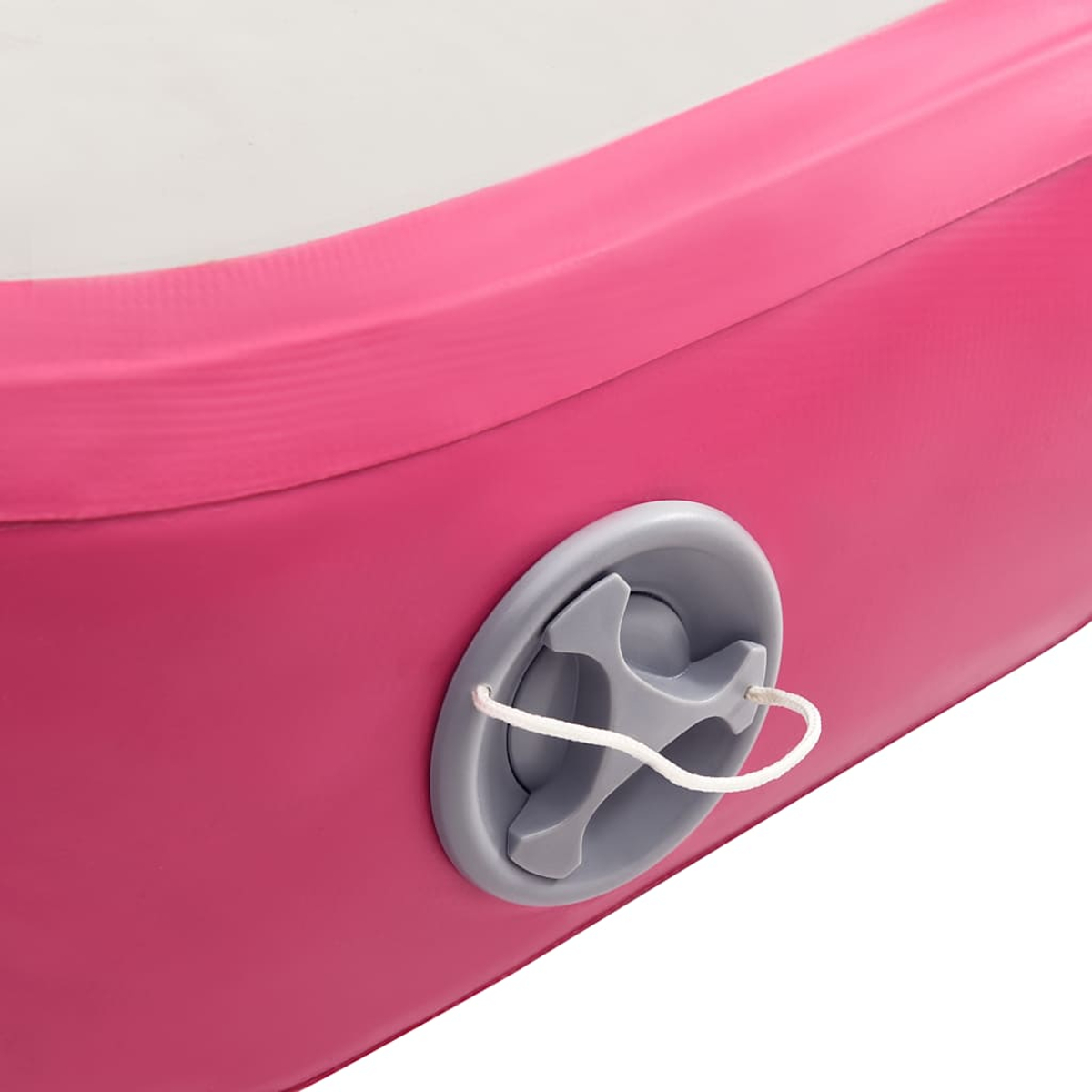 Nahaufnahme einer rosa aufblasbaren Matte mit einem grauen Ventil und einem weißen Faden. Der obere Teil ist weiß.