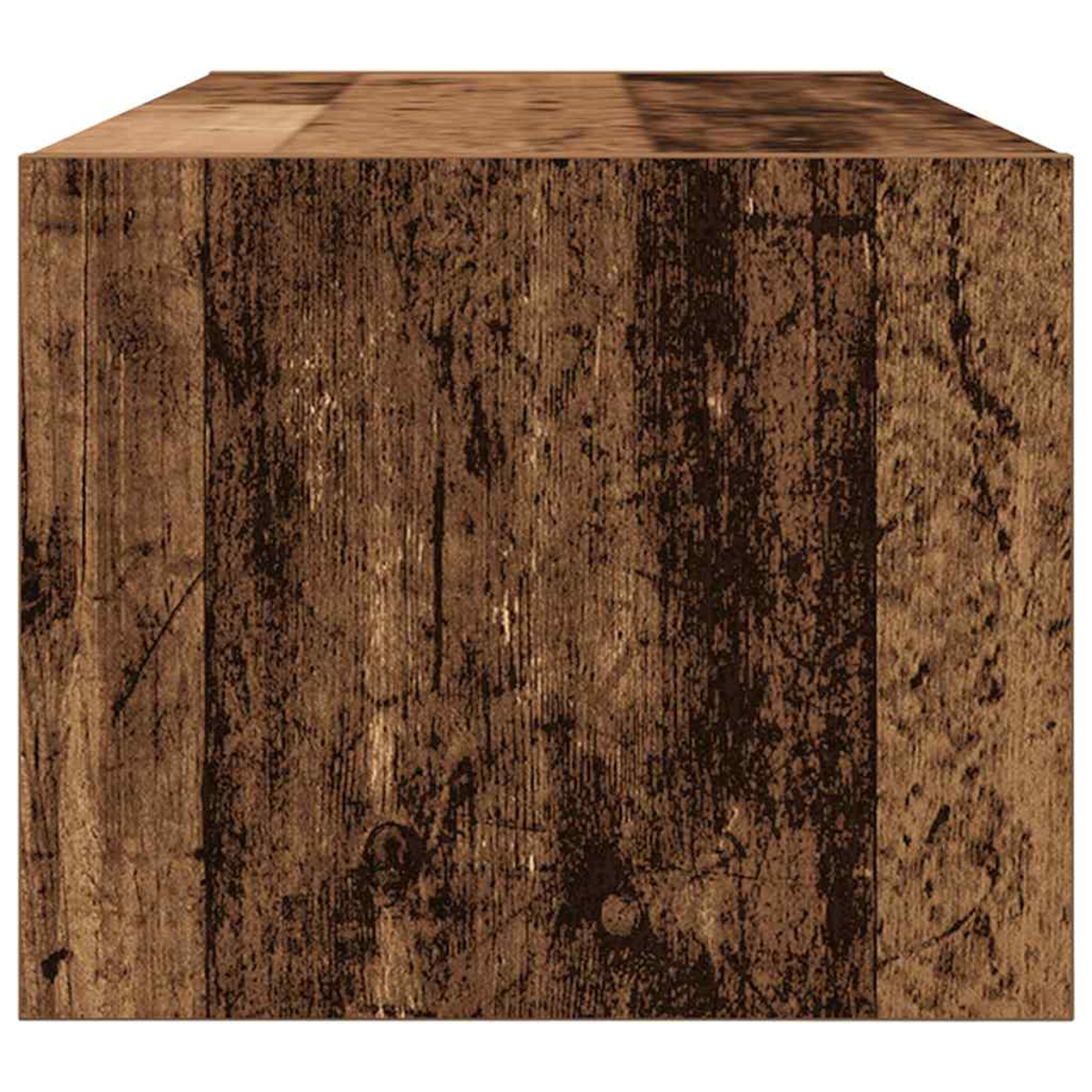 Ein Holzwürfel wird gezeigt. Der Würfel ist braun und hat eine Holzmaserung, mit sichtbaren Ästen und Unvollkommenheiten.