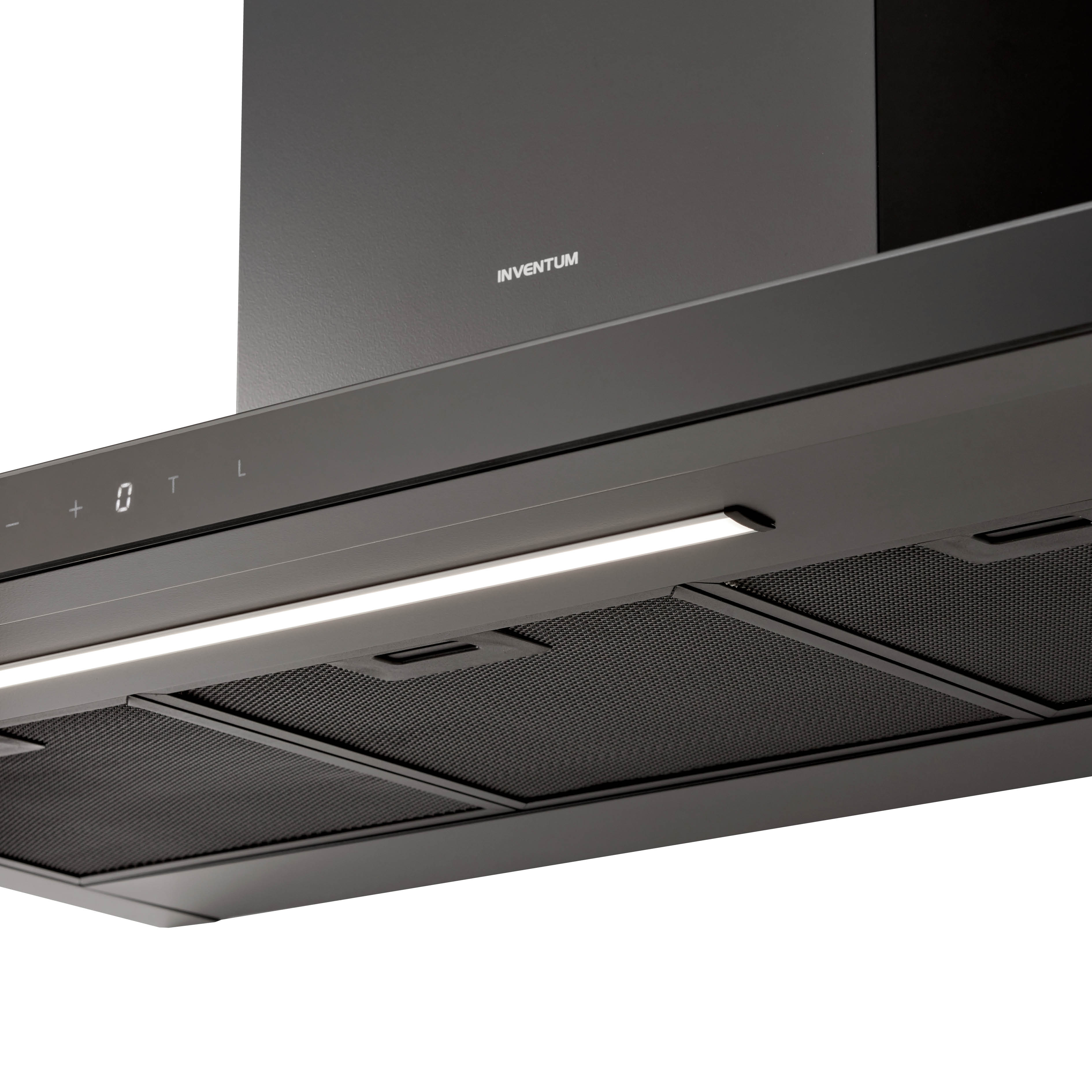 A black range hood with an illuminated light bar and mesh filters, the brand name 'INVENTUM' is visible.