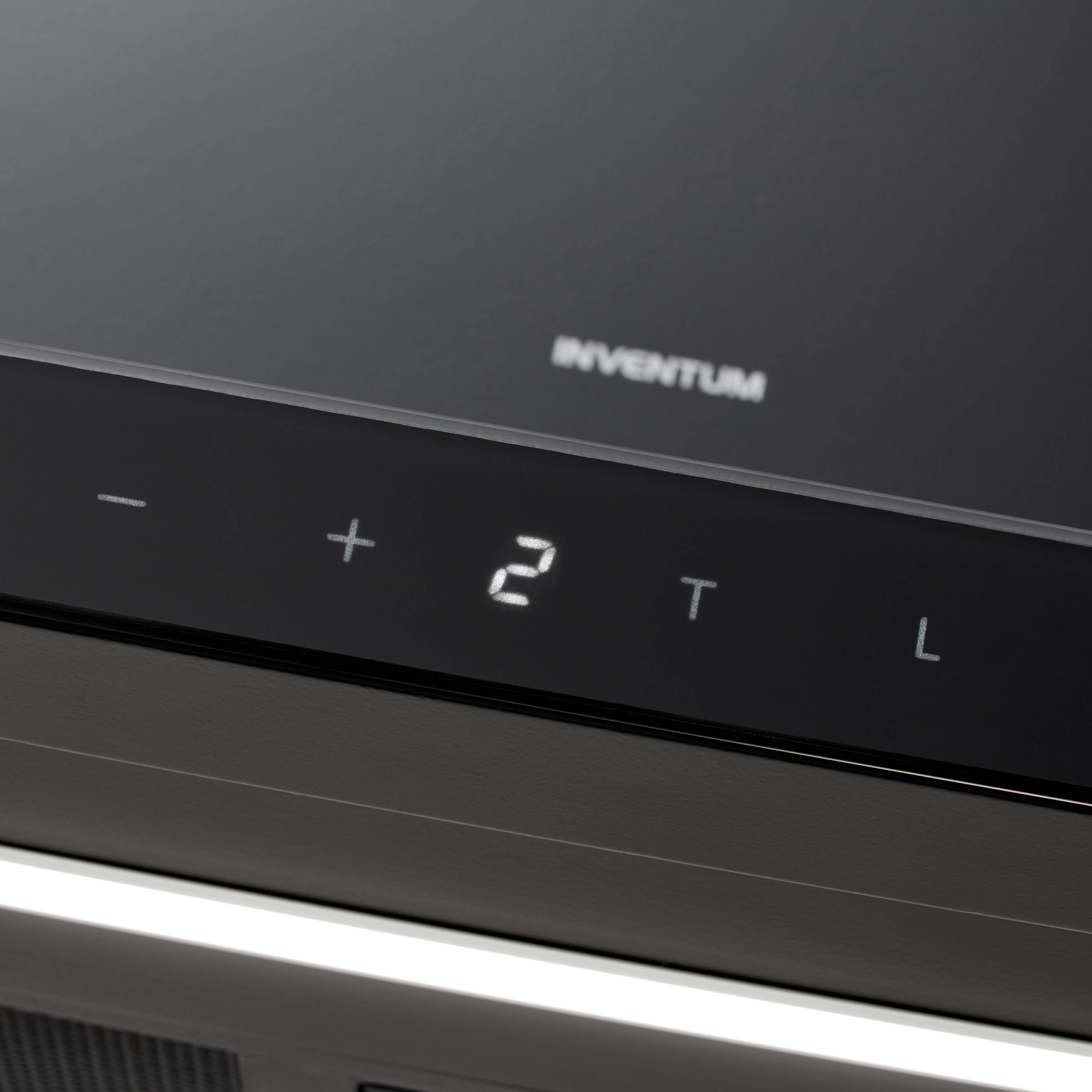 A close-up of a black appliance control panel with the brand name and a digital display showing numbers and letters.