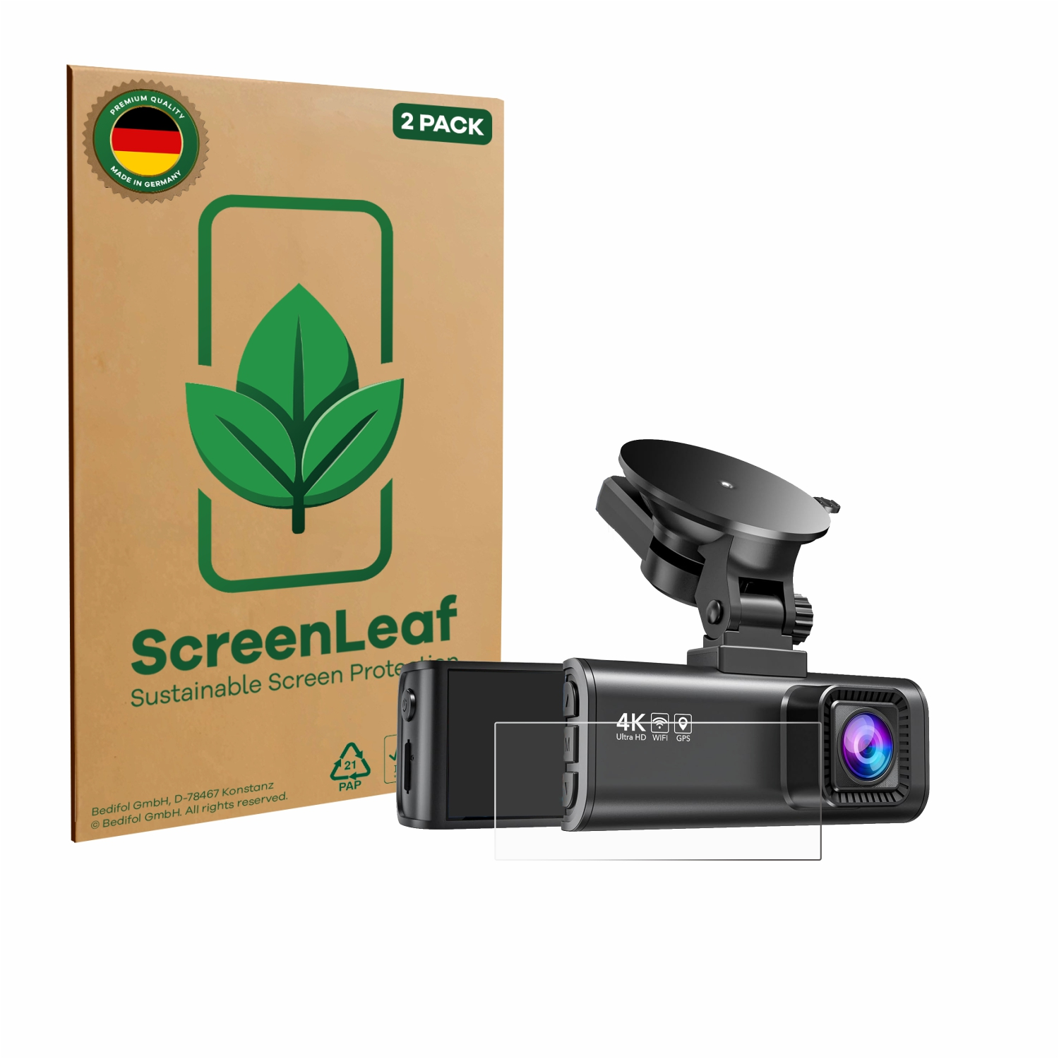 Eine Dashcam mit einer Displayschutzfolienpackung. Die Dashcam ist schwarz. Die Displayschutzfolienpackung ist braun mit einem grünen Blattlogo.