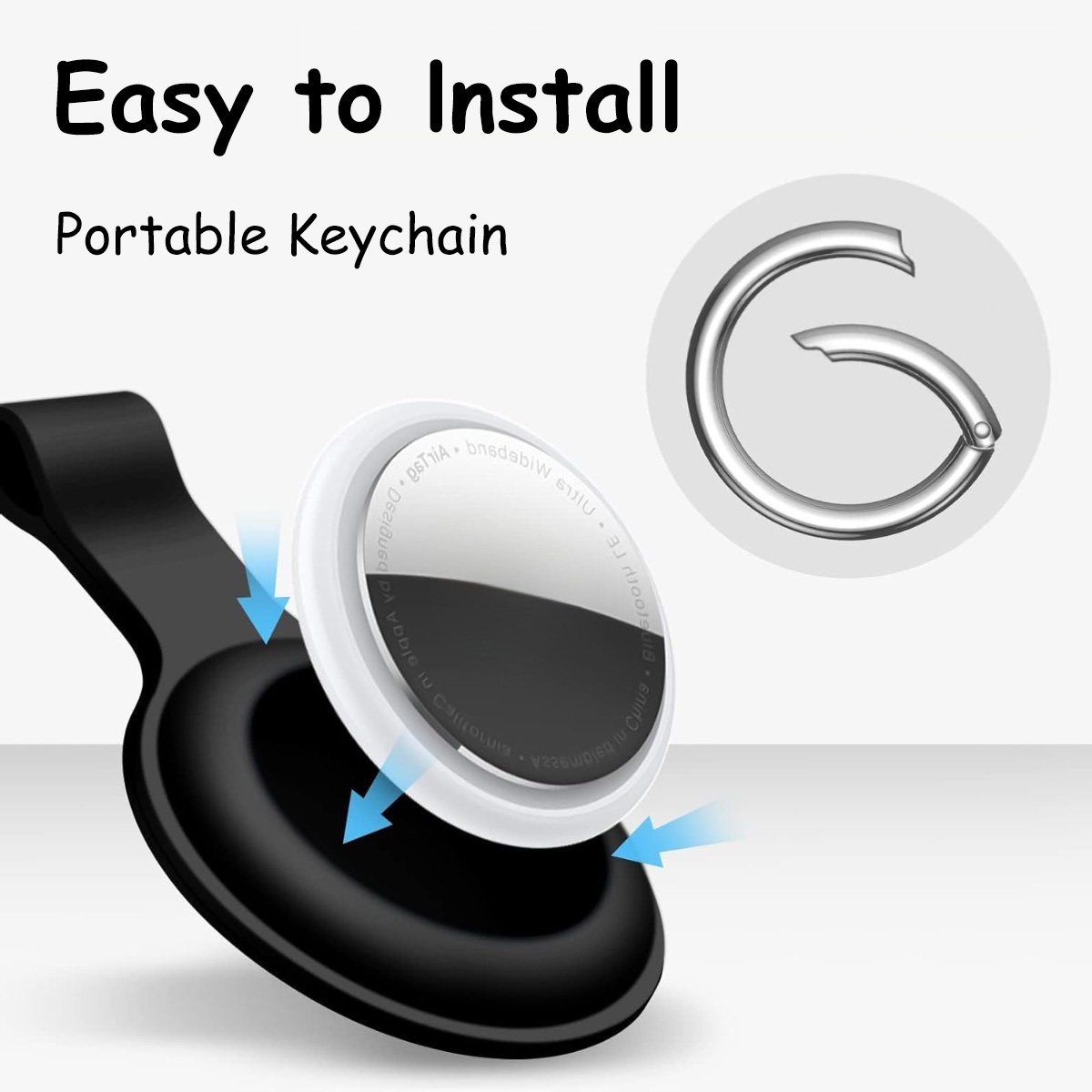 Das Bild zeigt ein weißes rundes Etikett mit einem schwarzen Halter, einen silbernen Schlüsselring und den Text Easy to Install Portable Keychain.
