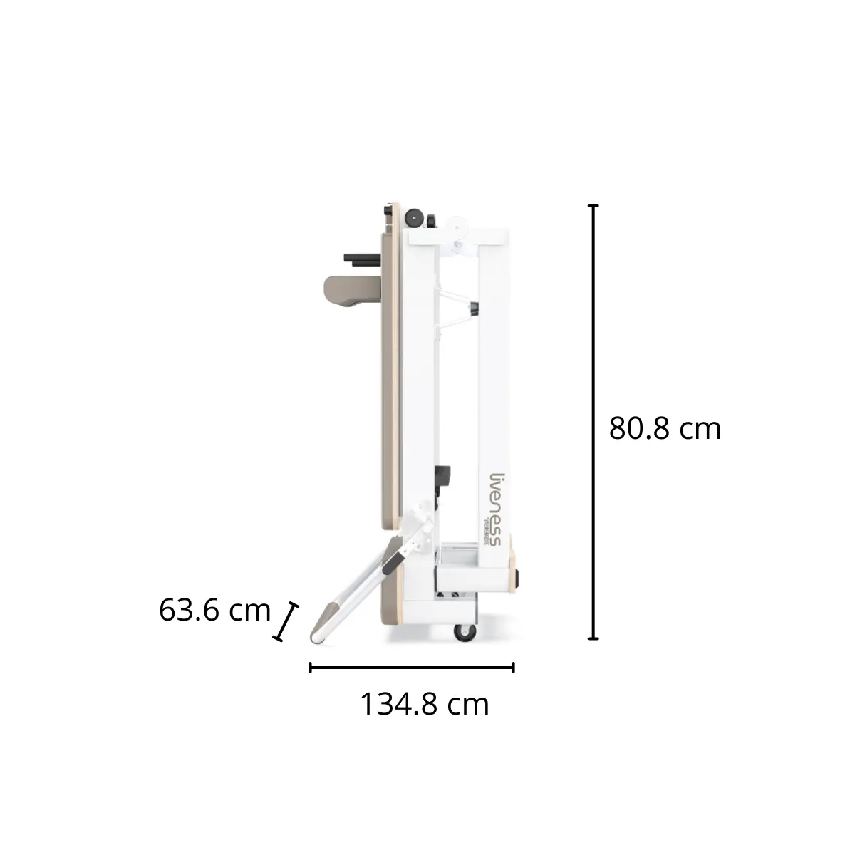 Folded white exercise equipment with beige pad. Dimensions: 134.8 cm long, 63.6 cm wide, 80.8 cm high. Brand name: liveness.