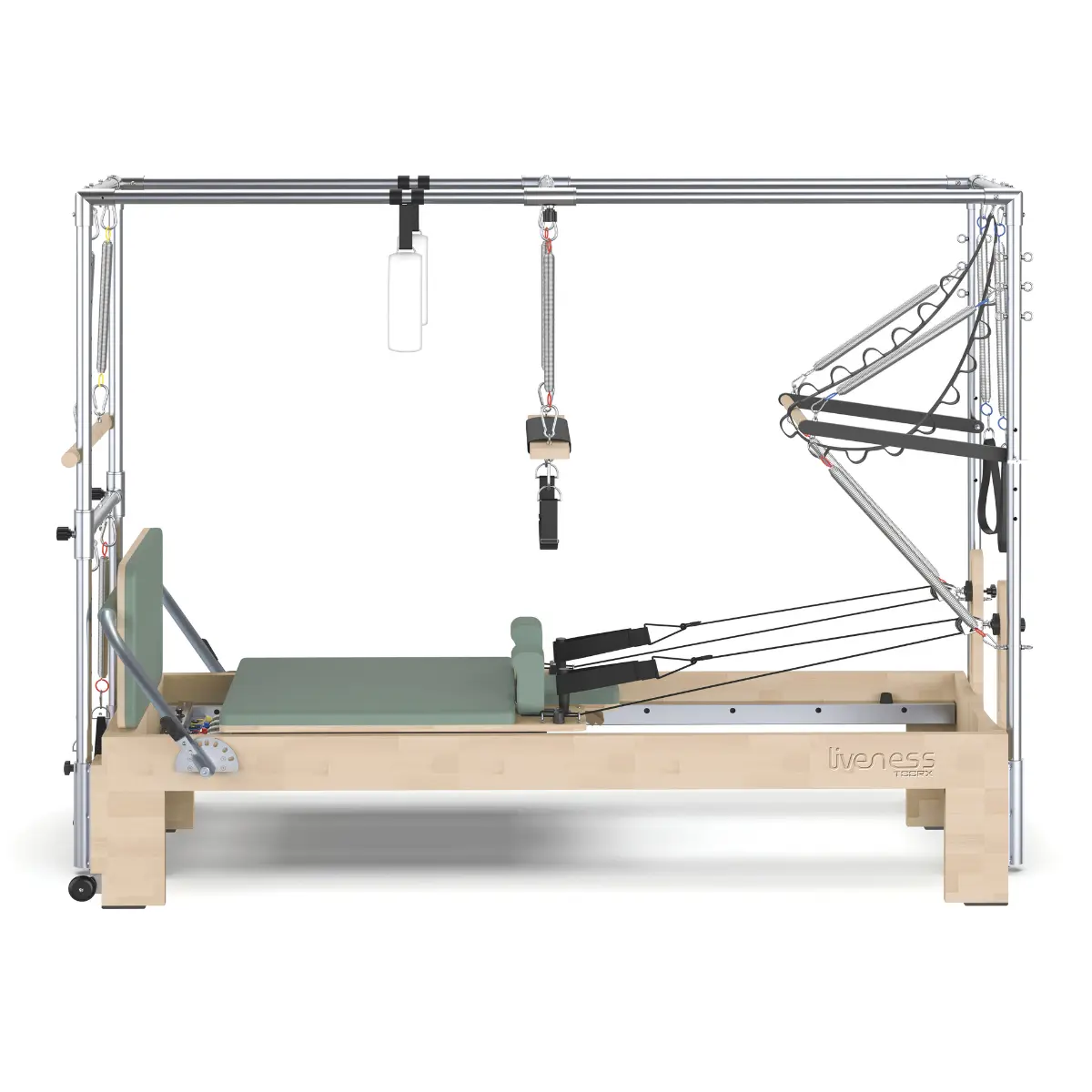 Pilates reformer machine. Beige wooden frame, green padding, and various springs and straps for exercise. The background is white.