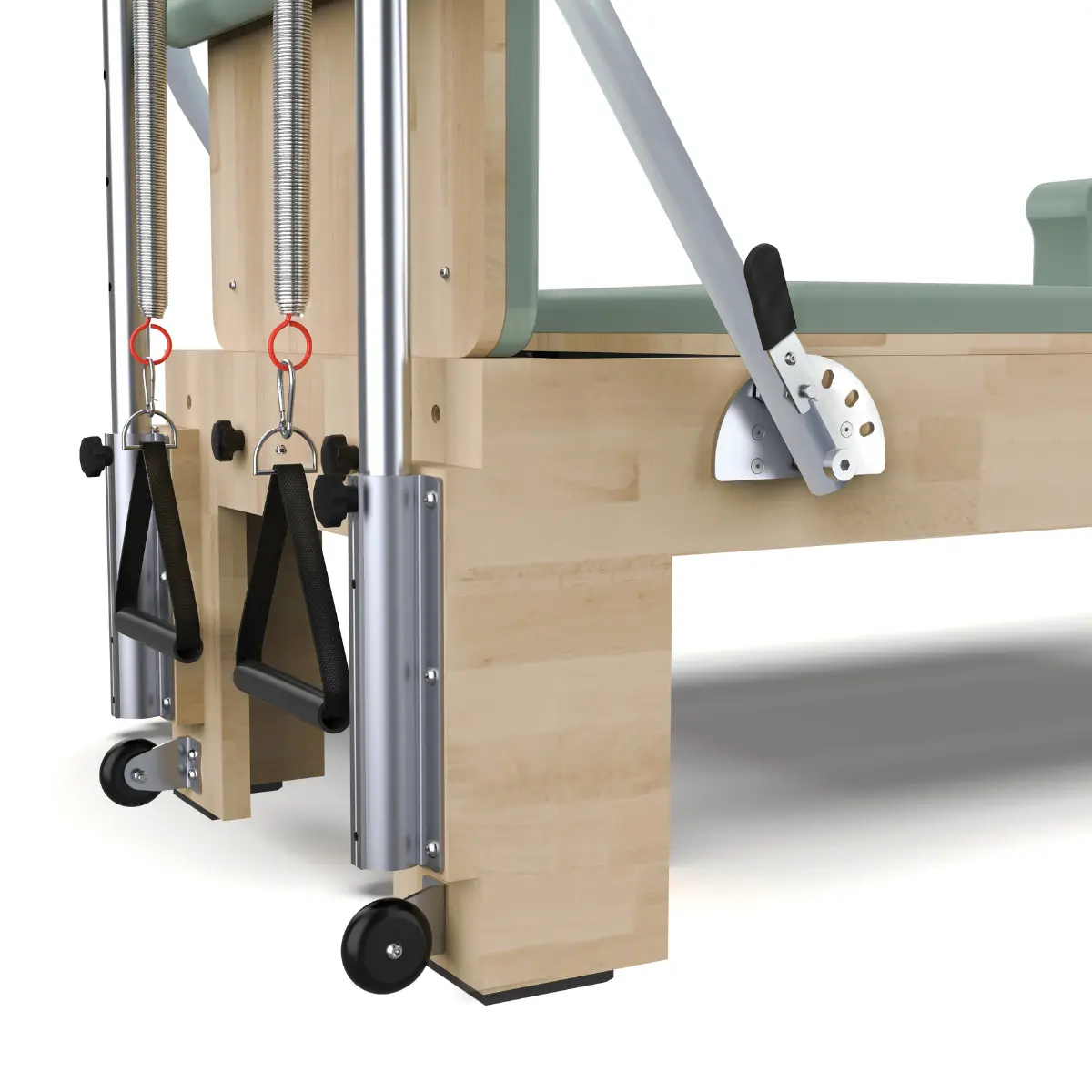 Pilates reformer machine with wooden frame, springs, and handles. Metal rails and black wheels are visible. A green padded seat is at the top.