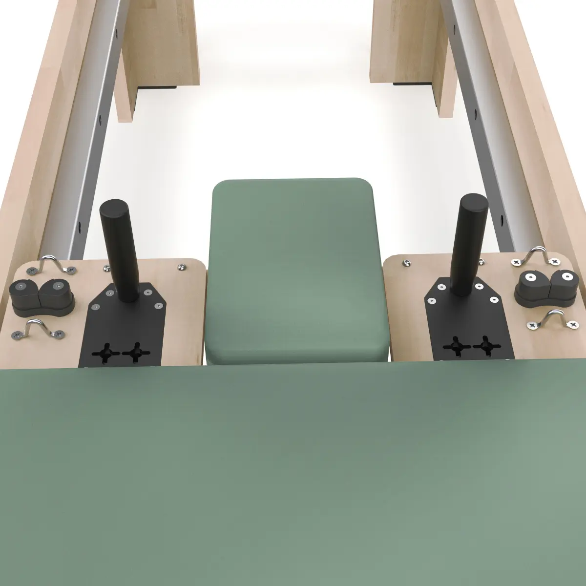 A close-up view shows a green exercise machine. It has a green seat and two black handles. The frame is beige and silver.