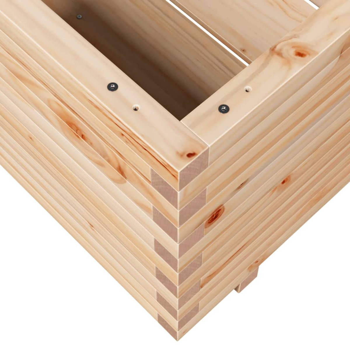 Nahaufnahme einer Holzkistecke. Die Kiste besteht aus hellem Holz mit sichtbarer Maserung. Schrauben sichern die Verbindungen.