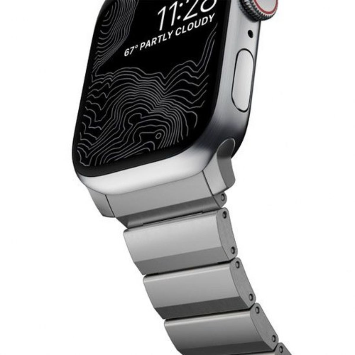 Un Apple Watch plateado con una pantalla negra que muestra la hora y el tiempo parcialmente nublado. La correa es plateada.