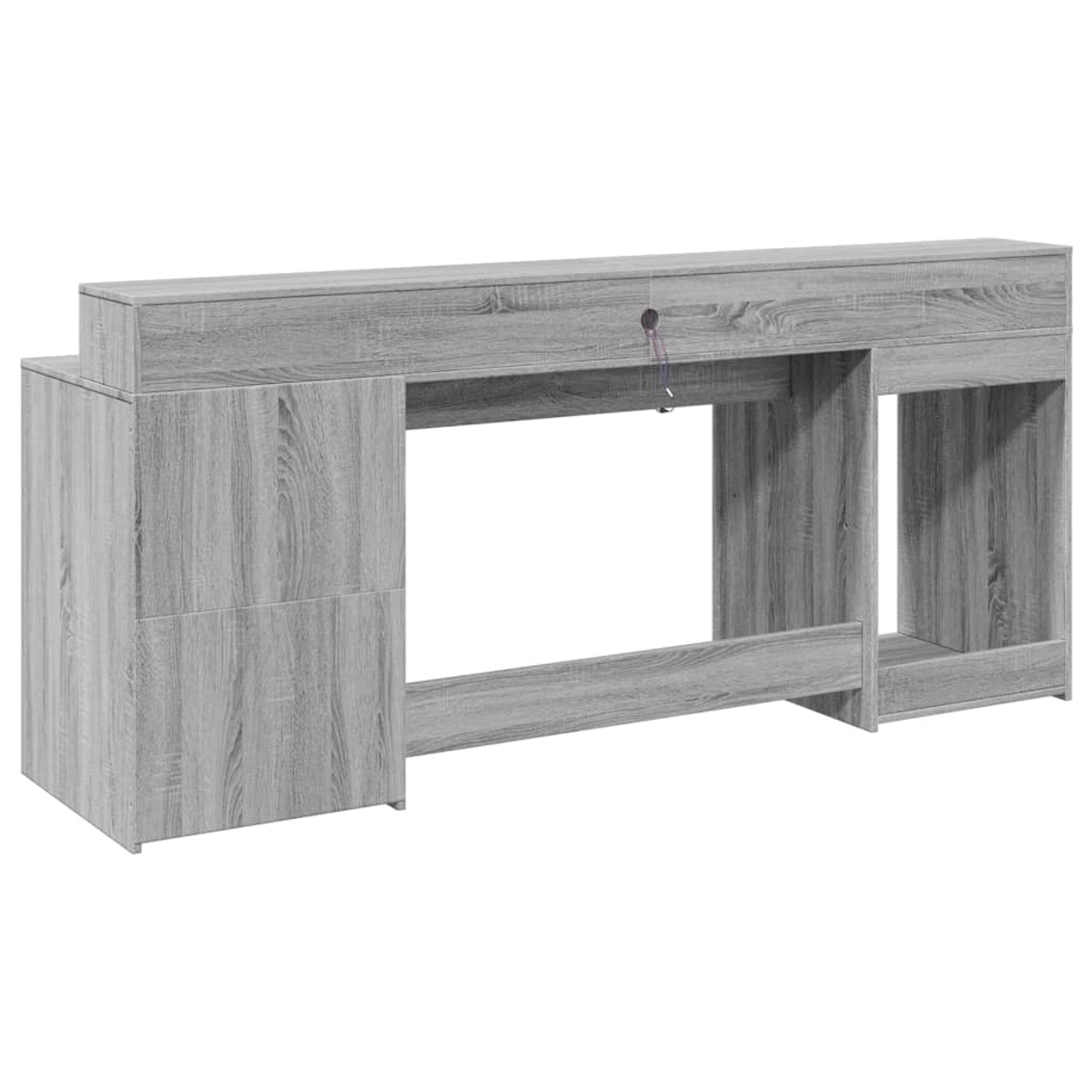 Ein grauer Holzschreibtisch mit Schubladen und offenen Bereichen. Ein Schlüssel befindet sich in der mittleren Schublade.