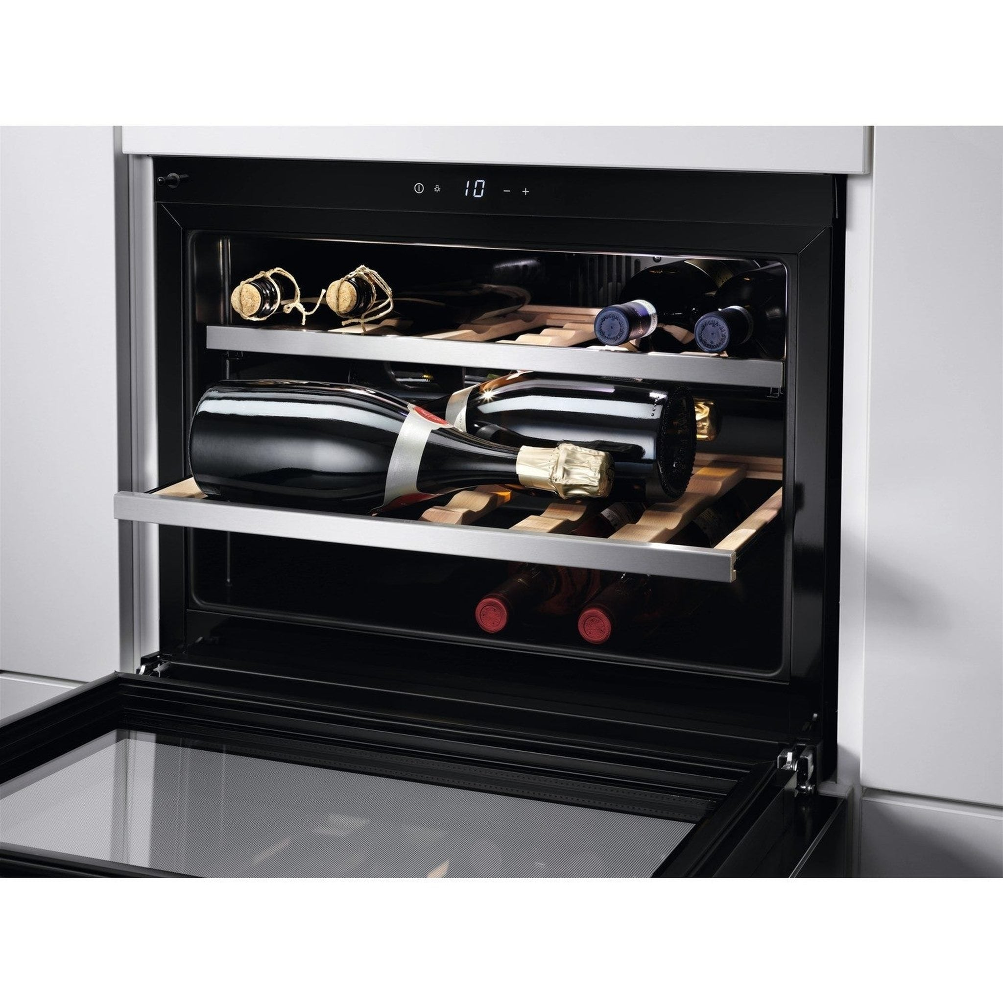 Wine cooler with open door, multiple wine bottles visible. Shelves hold various bottles. Temperature display at the top.