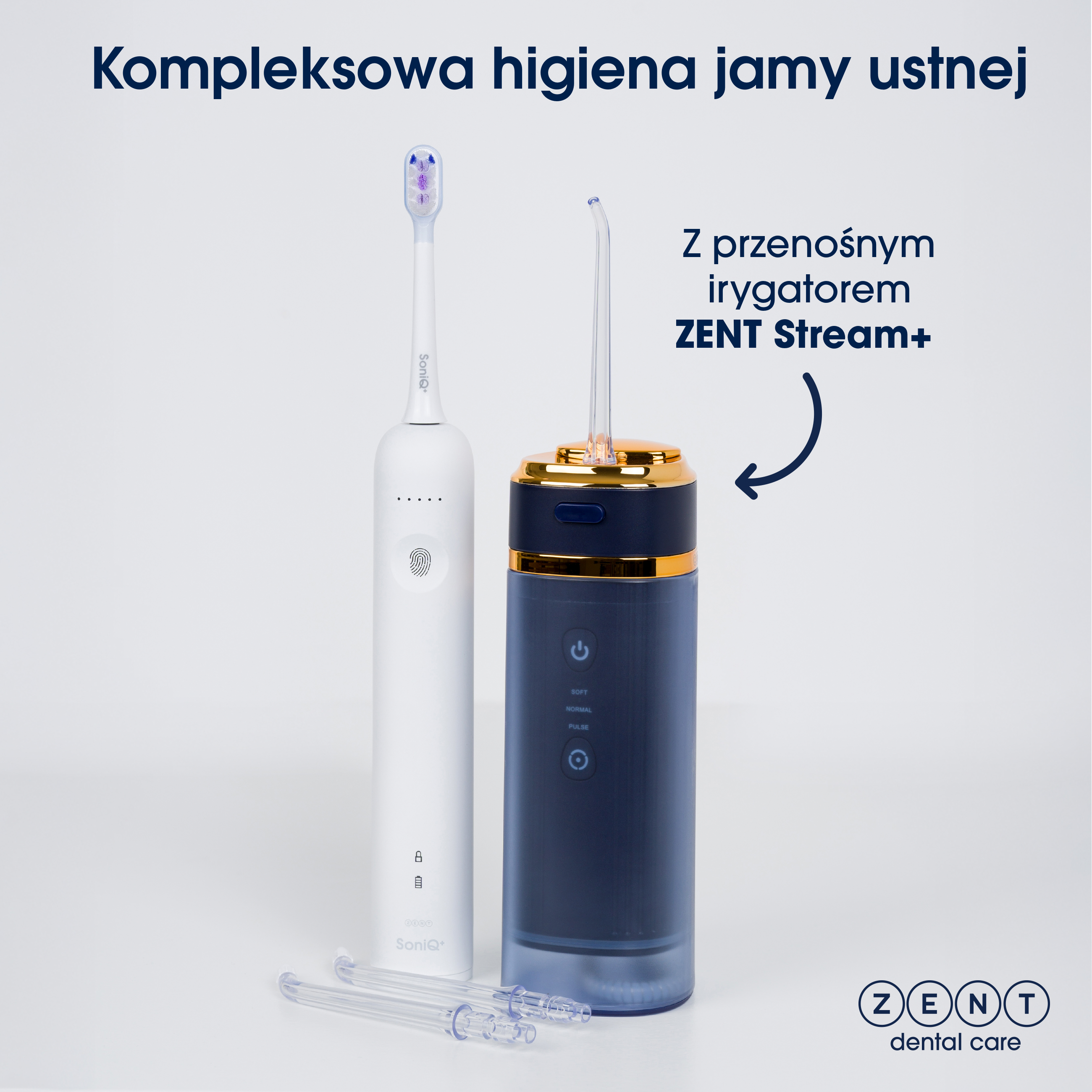 Biała elektryczna szczoteczka do zębów i granatowy irygator z złotymi akcentami na białej powierzchni.