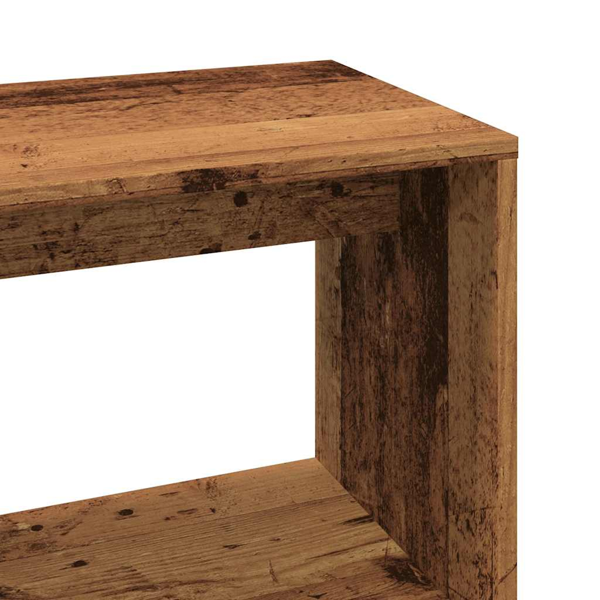 Nahaufnahme einer Holztischecke mit strukturierter Oberfläche und rechteckigem Rahmen. Das Holz hat einen warmen, braunen Farbton.