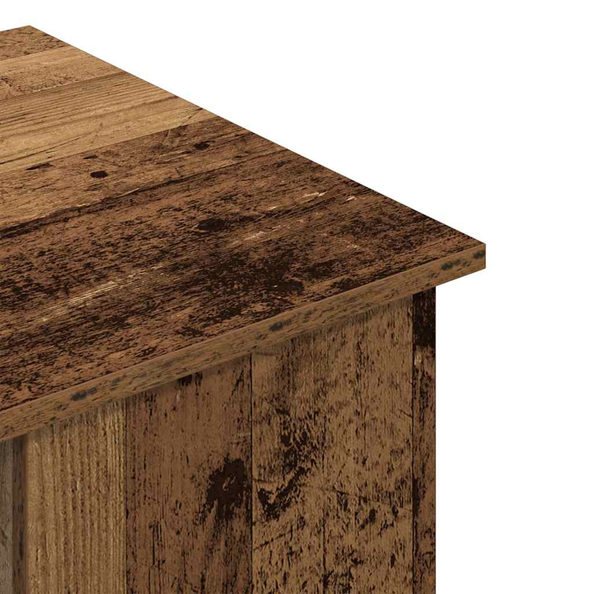 Nahaufnahme einer Holztischecke. Das Holz hat einen Used-Look mit verschiedenen Brauntönen, sichtbarer Maserung und Unvollkommenheiten.