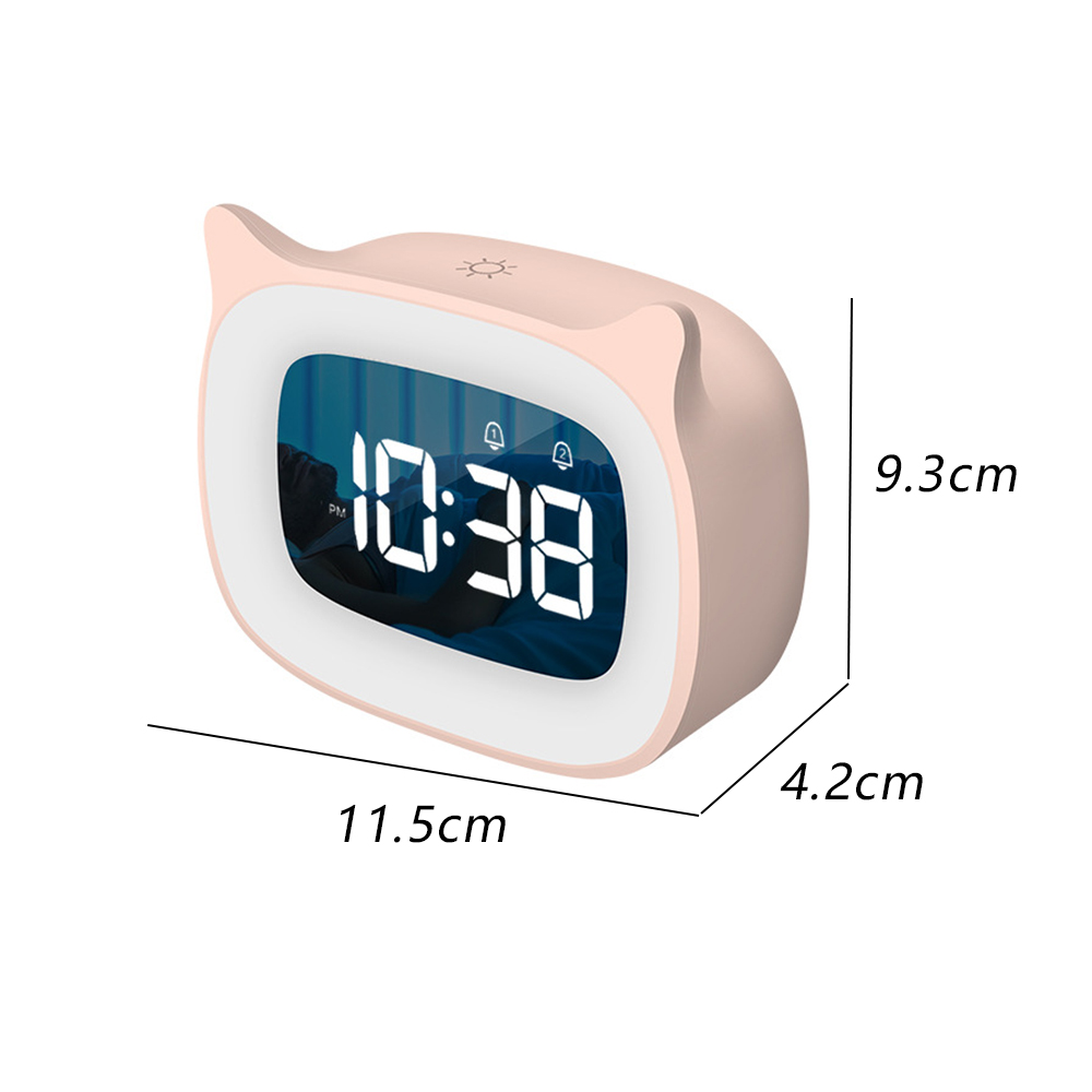 Rosa katzenförmiger digitaler Wecker mit der Anzeige 10:38. Abmessungen: 11,5 cm x 9,3 cm x 4,2 cm. Enthält Alarm- und Sonnensymbol.