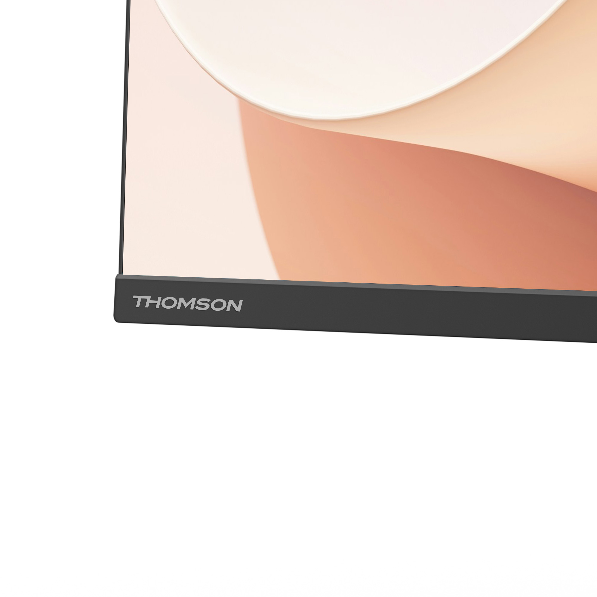 Primer plano de un monitor Thomson negro. La pantalla muestra un color melocotón claro. La marca es visible.