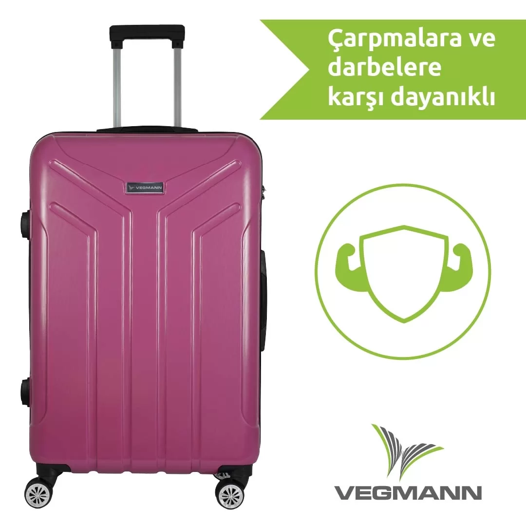 Geri çekilebilir bir tutamağa sahip pembe bir Vegmann bavul. Tekerlekleri ve logosu var. Metin: 'Çarpmalara ve darbelere karşı dayanıklı'.