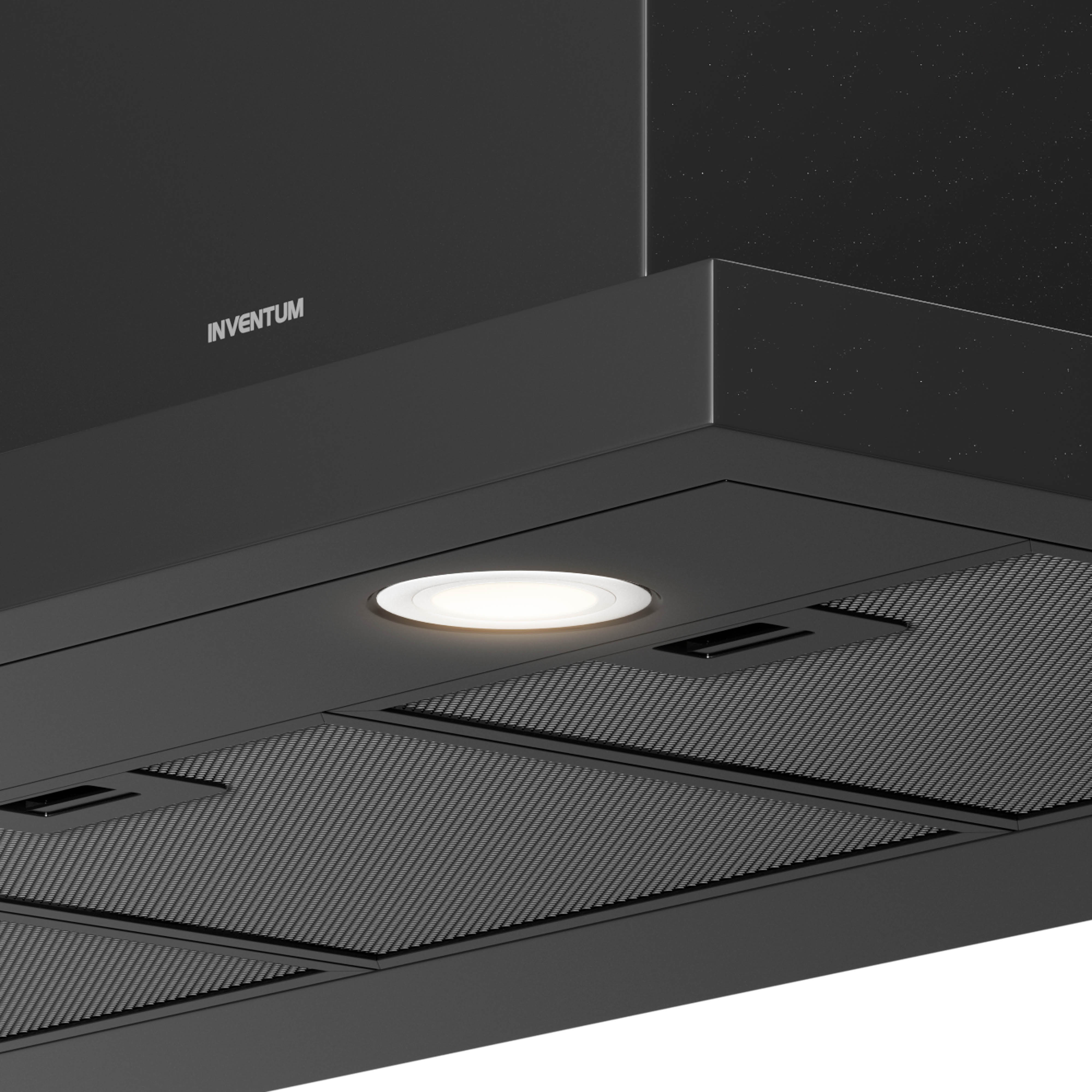 Close-up of a black range hood. It features a light, mesh filters, and the brand name 'INVENTUM'.