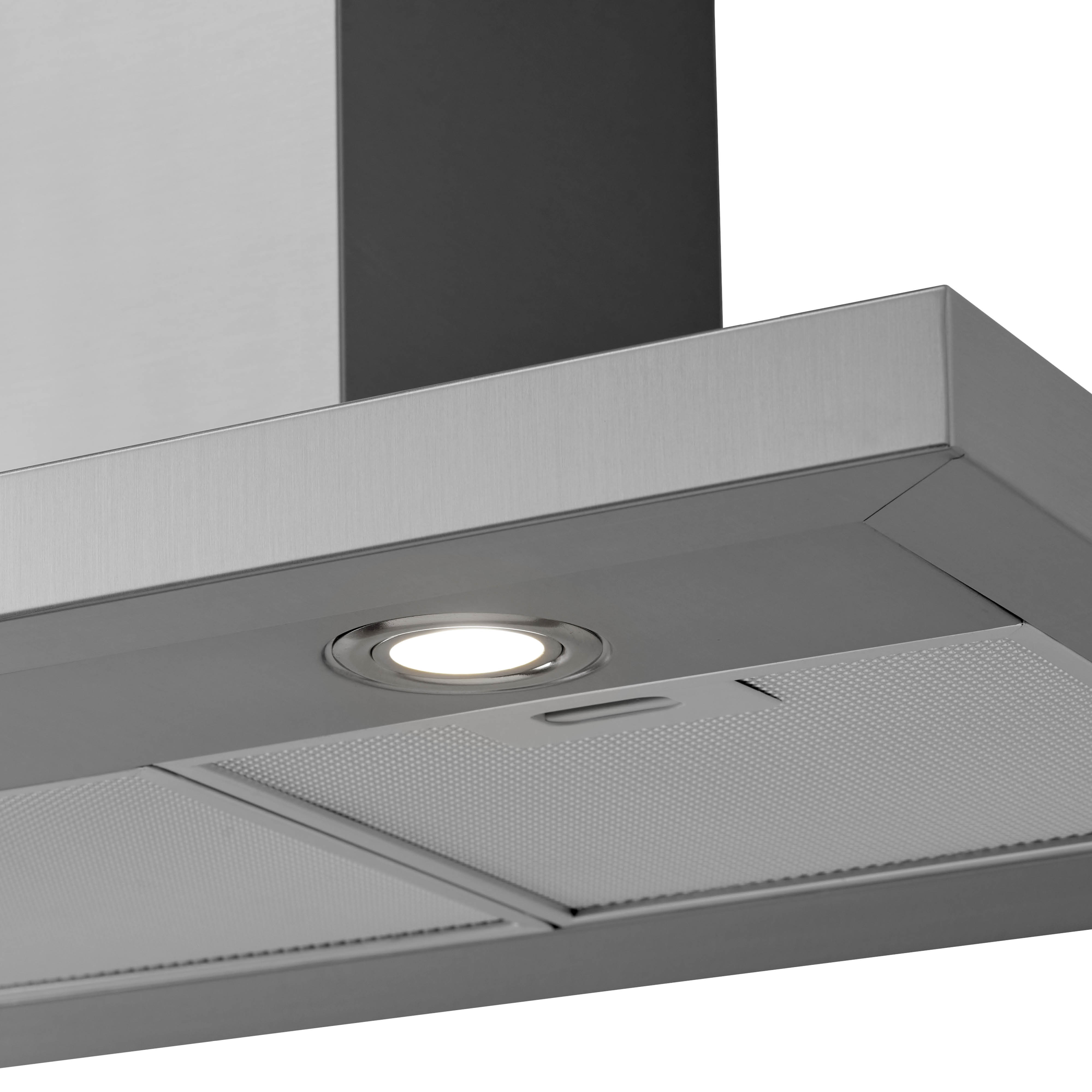 Close-up of a stainless steel range hood with a bright light. Background is white.