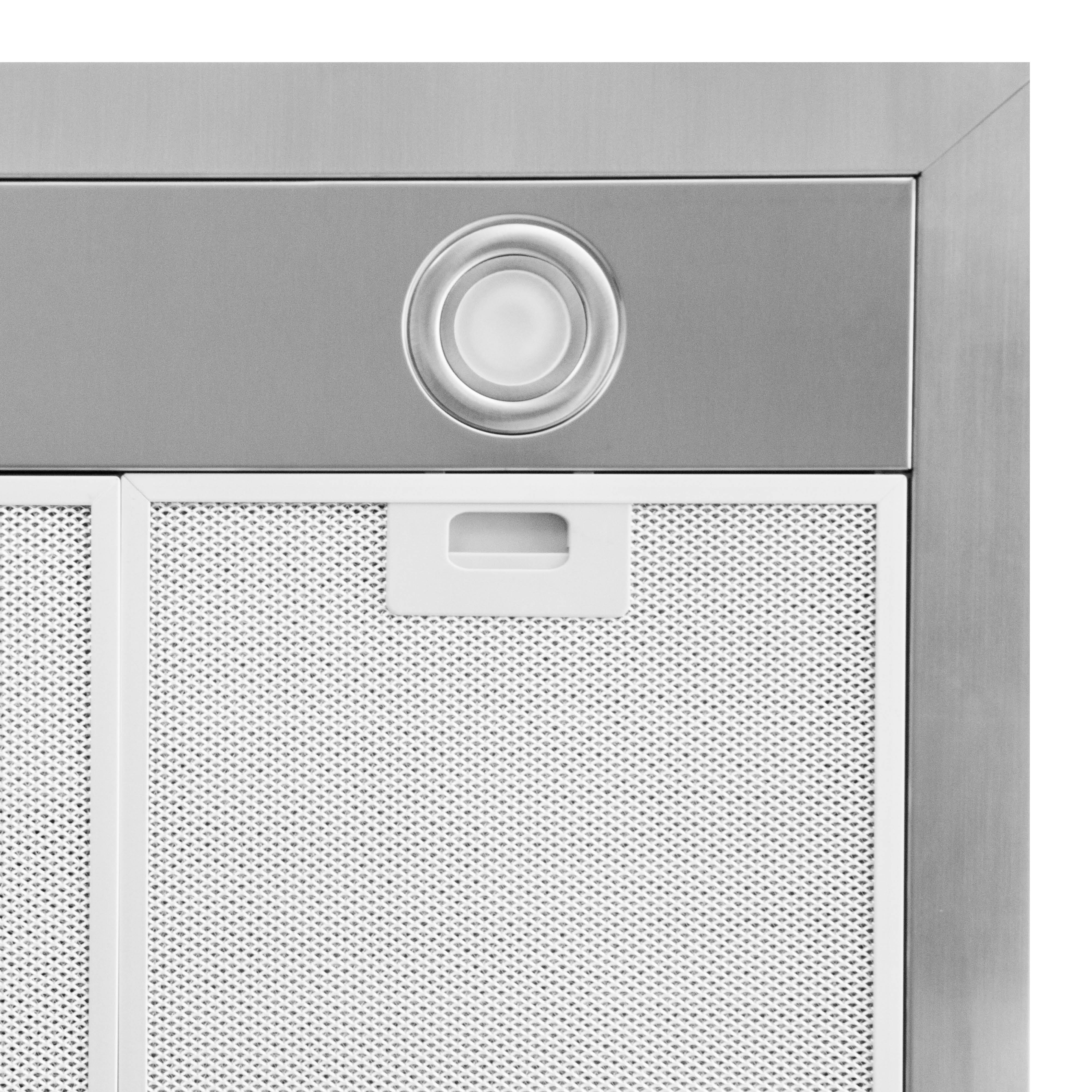 Close-up of a kitchen range hood. It has a light, filter, and metal frame. The filter is a white mesh.