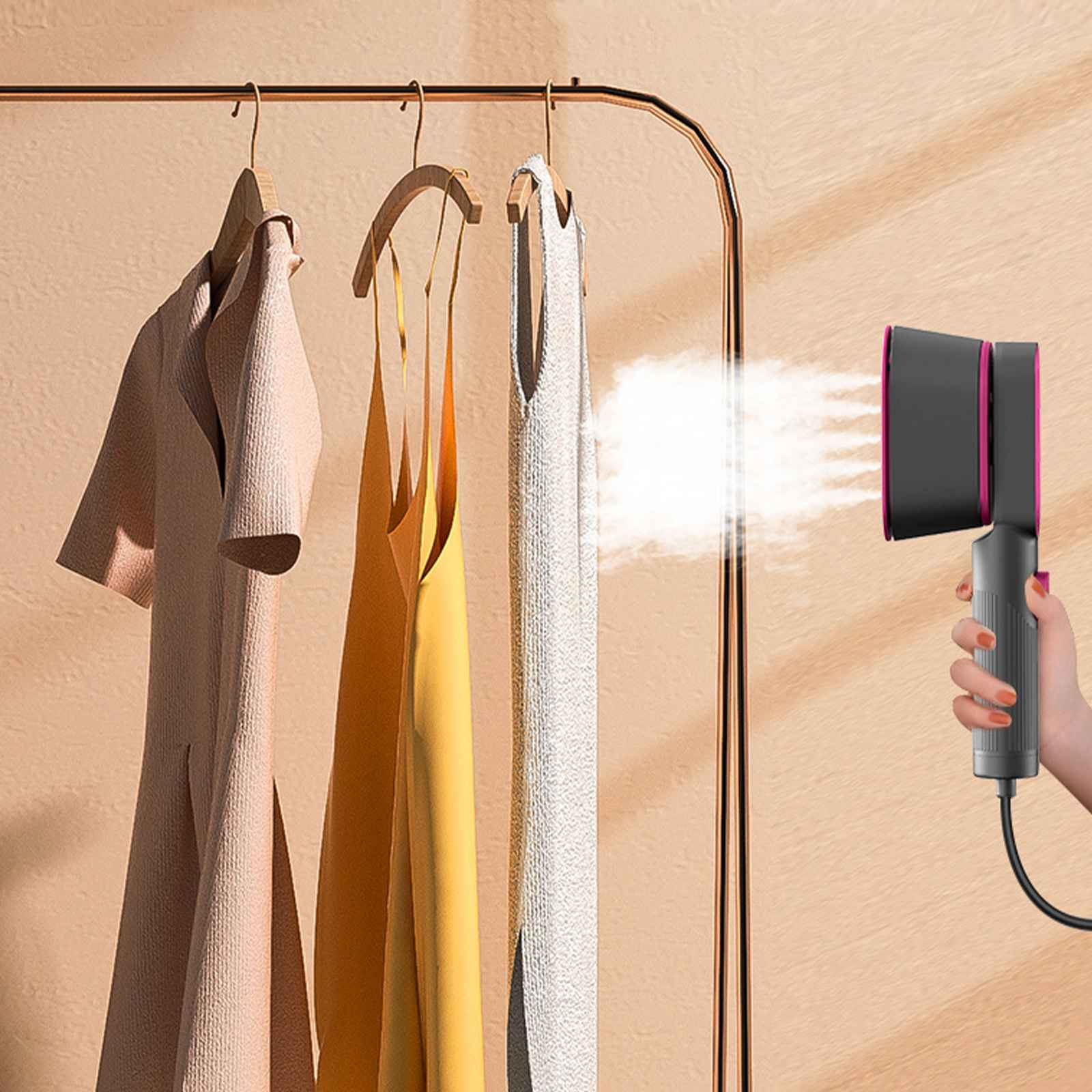 Kleidung auf einem Ständer mit Dampfgarer. Eine Hand hält den Steamer, Dampf kommt heraus. Pinke, gelbe und weiße Kleidung.