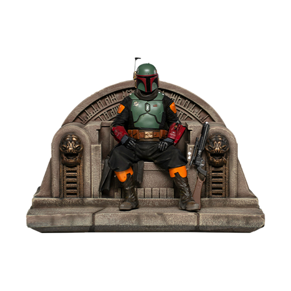 Figura di Boba Fett seduta su un trono. Indossa un'armatura verde e nera, con un elmo. Un blaster è appoggiato al trono.