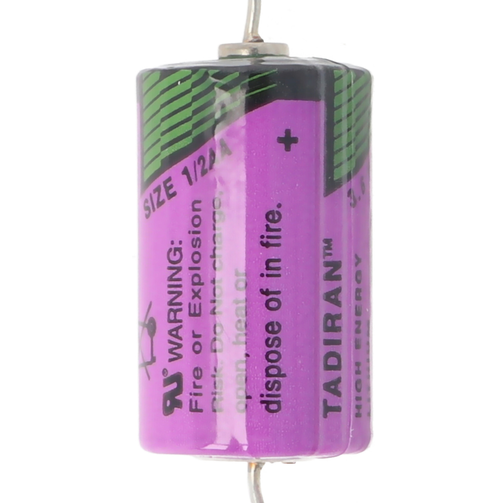 Eine lila-grüne Batterie mit Warnhinweisen und dem Text 'TADIRAN'. Drähte erstrecken sich von beiden Enden. Der Hintergrund ist schlicht.
