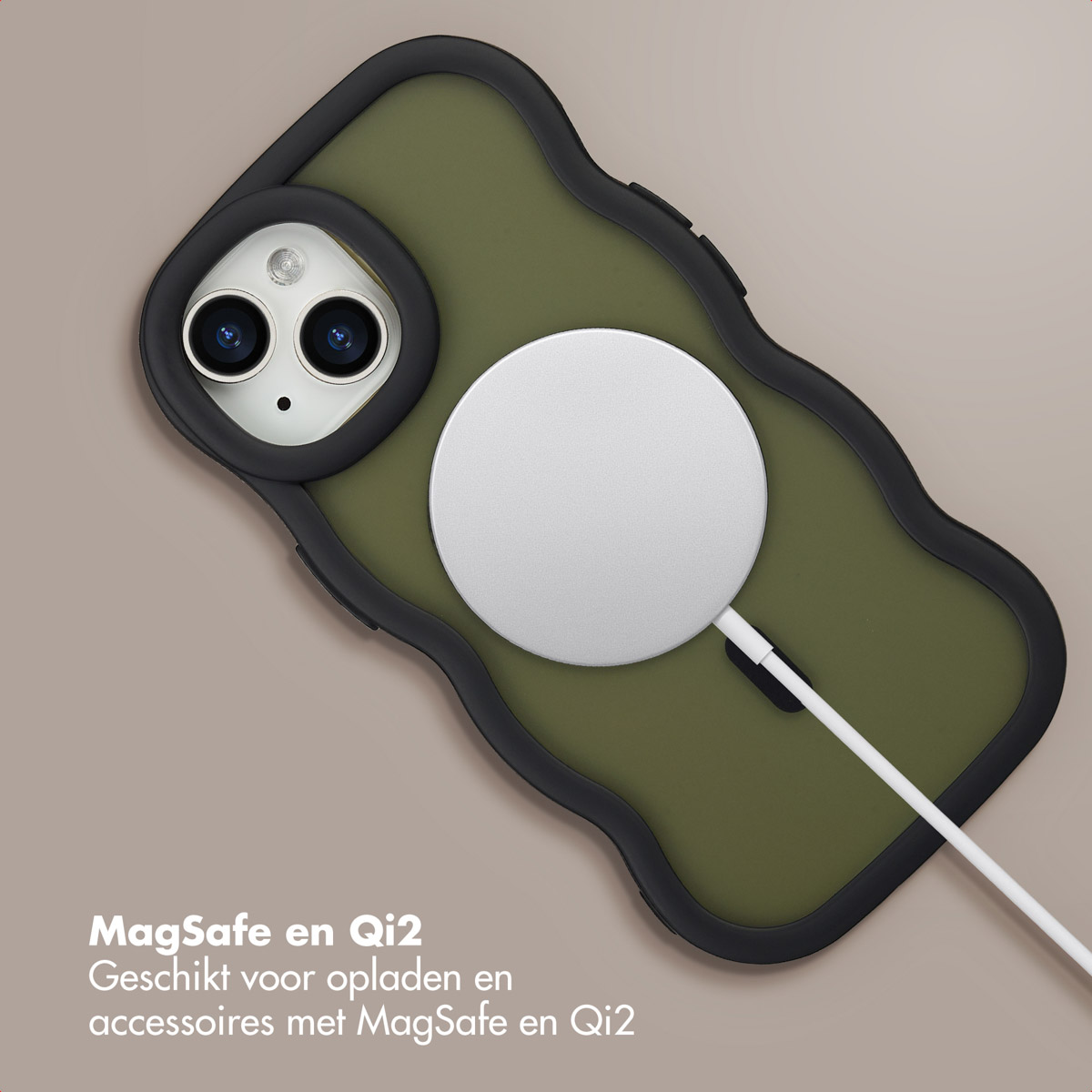 An olive green phone case with a black border, a white MagSafe charger, and a white cable, lying on a beige surface.