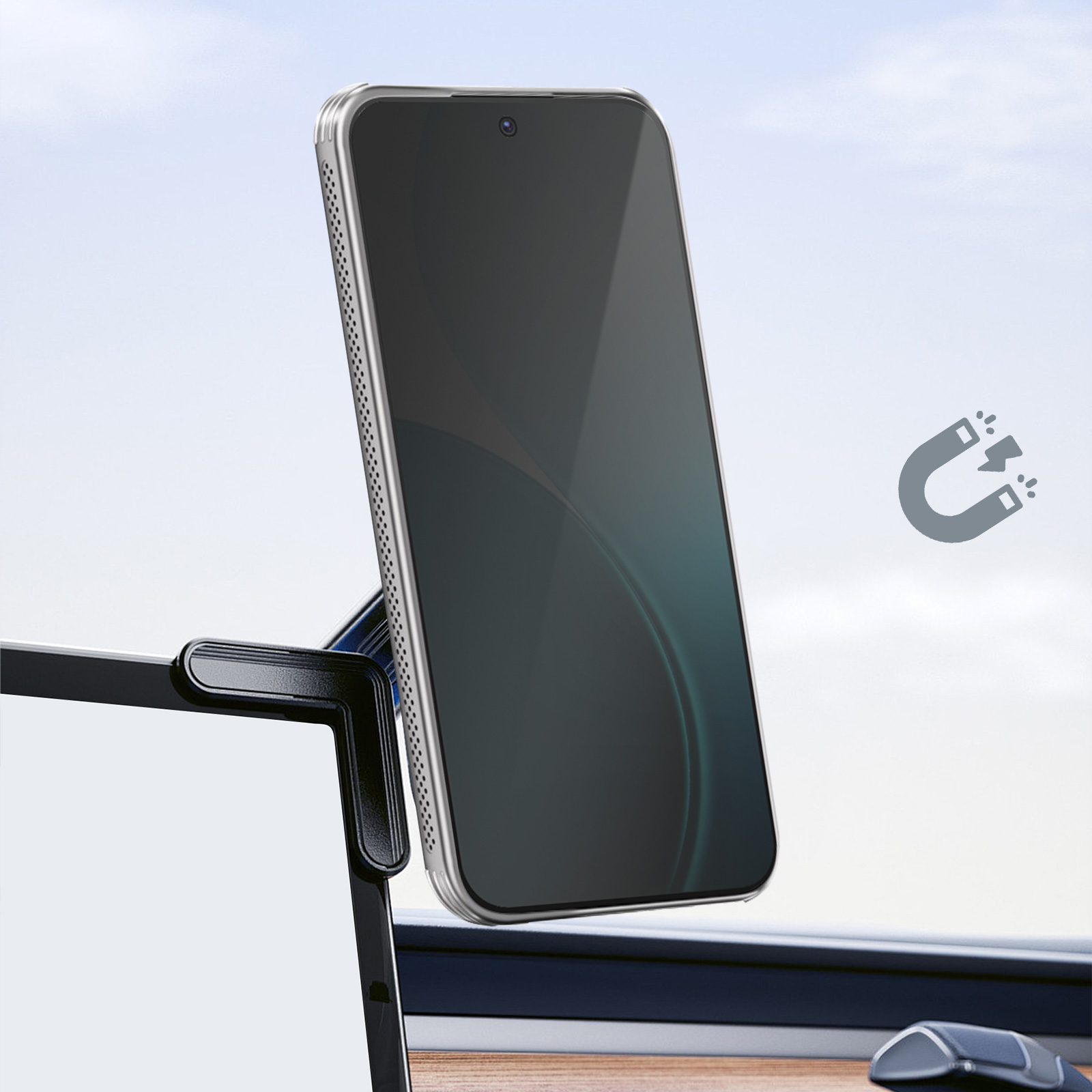 Smartphone su supporto, con simbolo magnetico. Telefono con schermo scuro. Supporto nero. Sfondo cielo.
