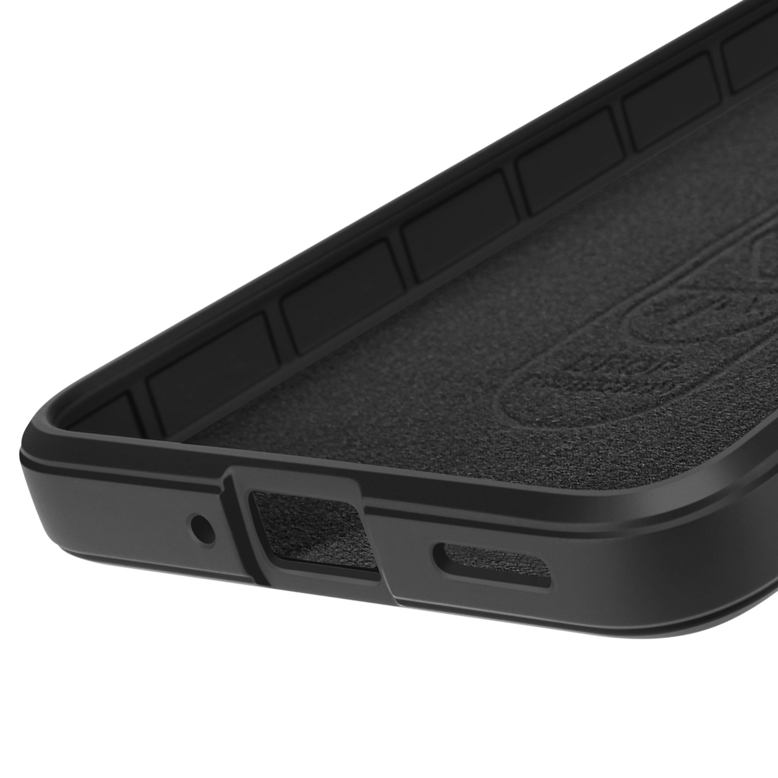 Gros plan sur une coque de téléphone noire. Elle a un intérieur texturé et des ouvertures pour les boutons et les ports.