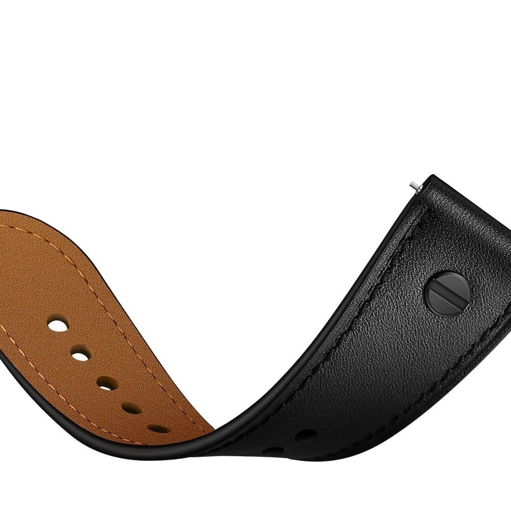 Nahaufnahme eines Uhrenarmbands. Schwarzes Lederarmband mit brauner Lederunterseite, mit Löchern und einem Metallverschluss.