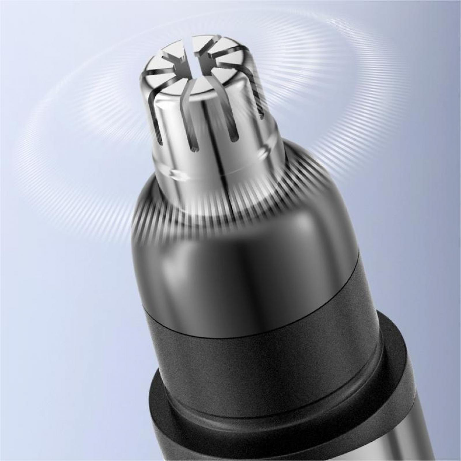 Nahaufnahme eines Nasenhaartrimmers. Das Gerät ist silber und schwarz, mit einem Maschenkopf und einem rotierenden Element-Design.