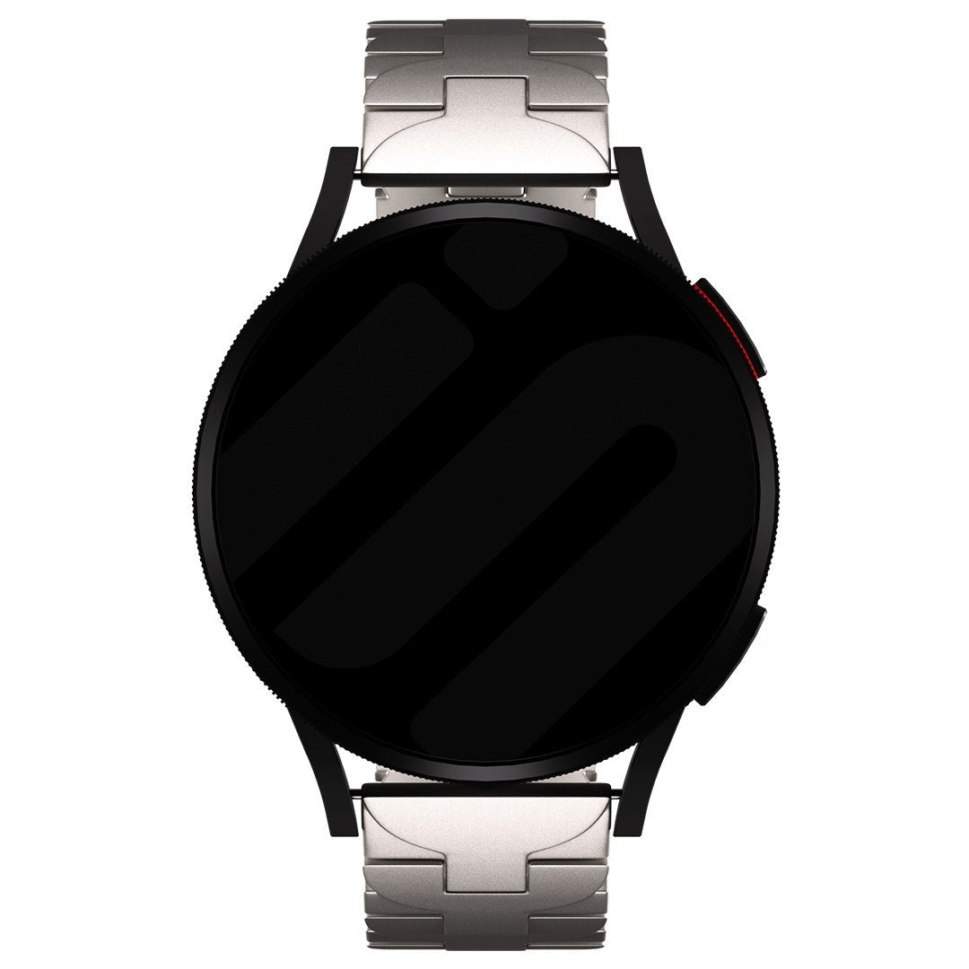 Eine runde, schwarze Smartwatch mit silbernem Metallarmband. Das Zifferblatt ist schwarz. An der Seite befindet sich eine rote Taste.